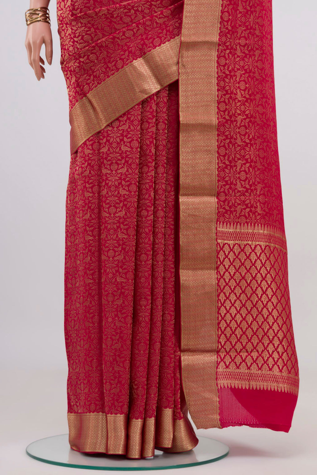 Pleats and pallu of Pink Mysore Crepe Saree with Zari Brocade on the body and Zari Border. 