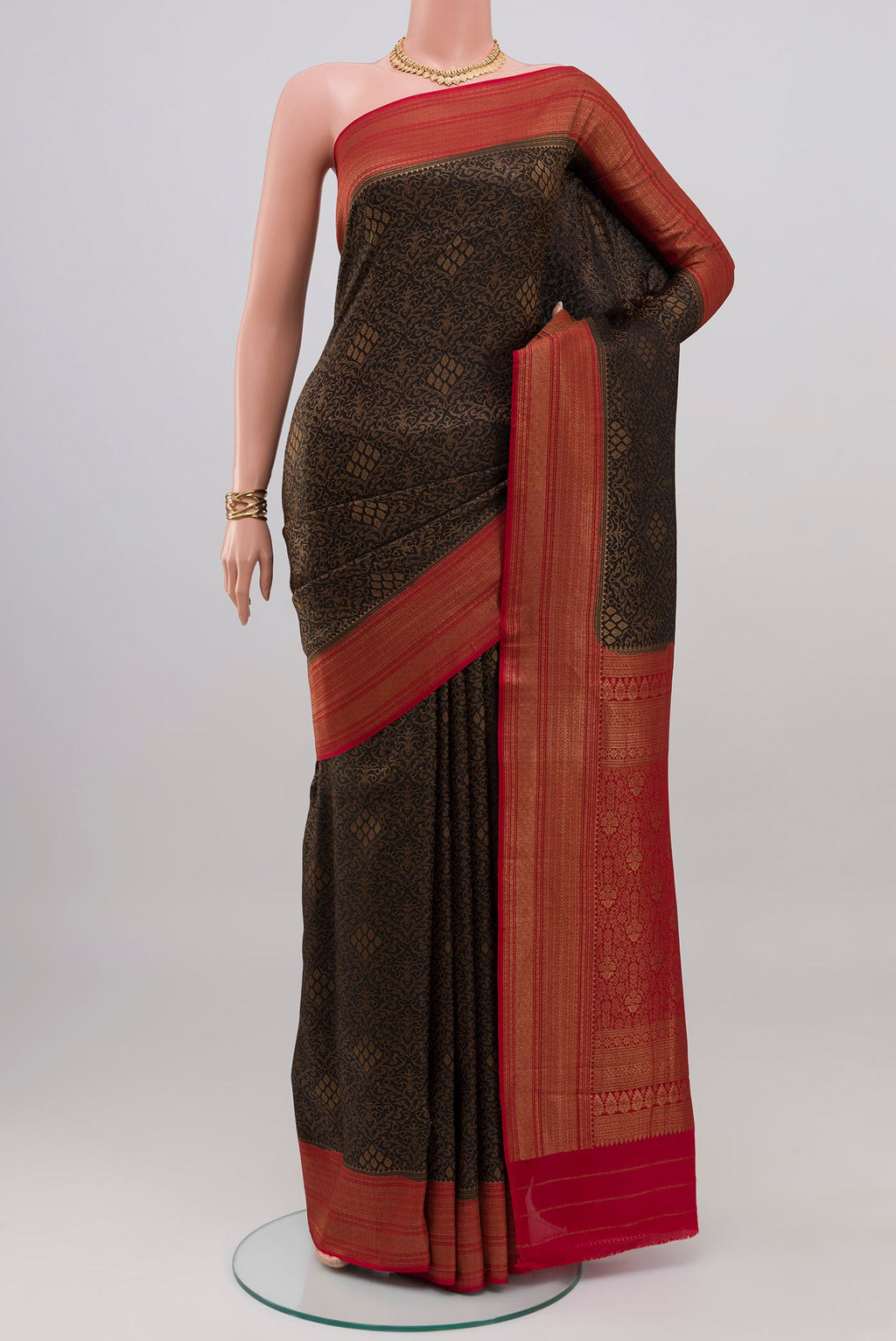 Black Mysore Crepe Saree with Zari Brocade on the body and Zari Border.  displayed on a mannequin