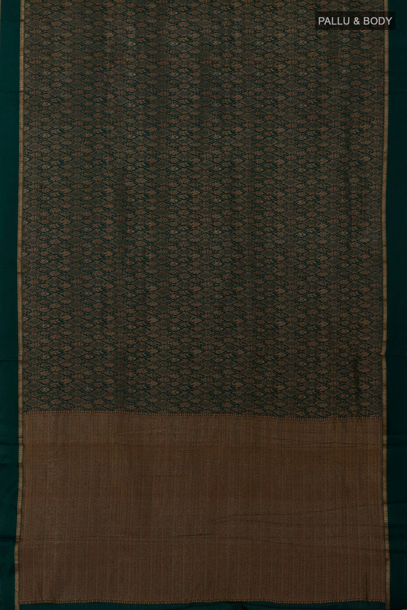 Flat view of Bottle Green Mysore Crepe Saree with Zari Brocade on the body and Thin Zari Line. 