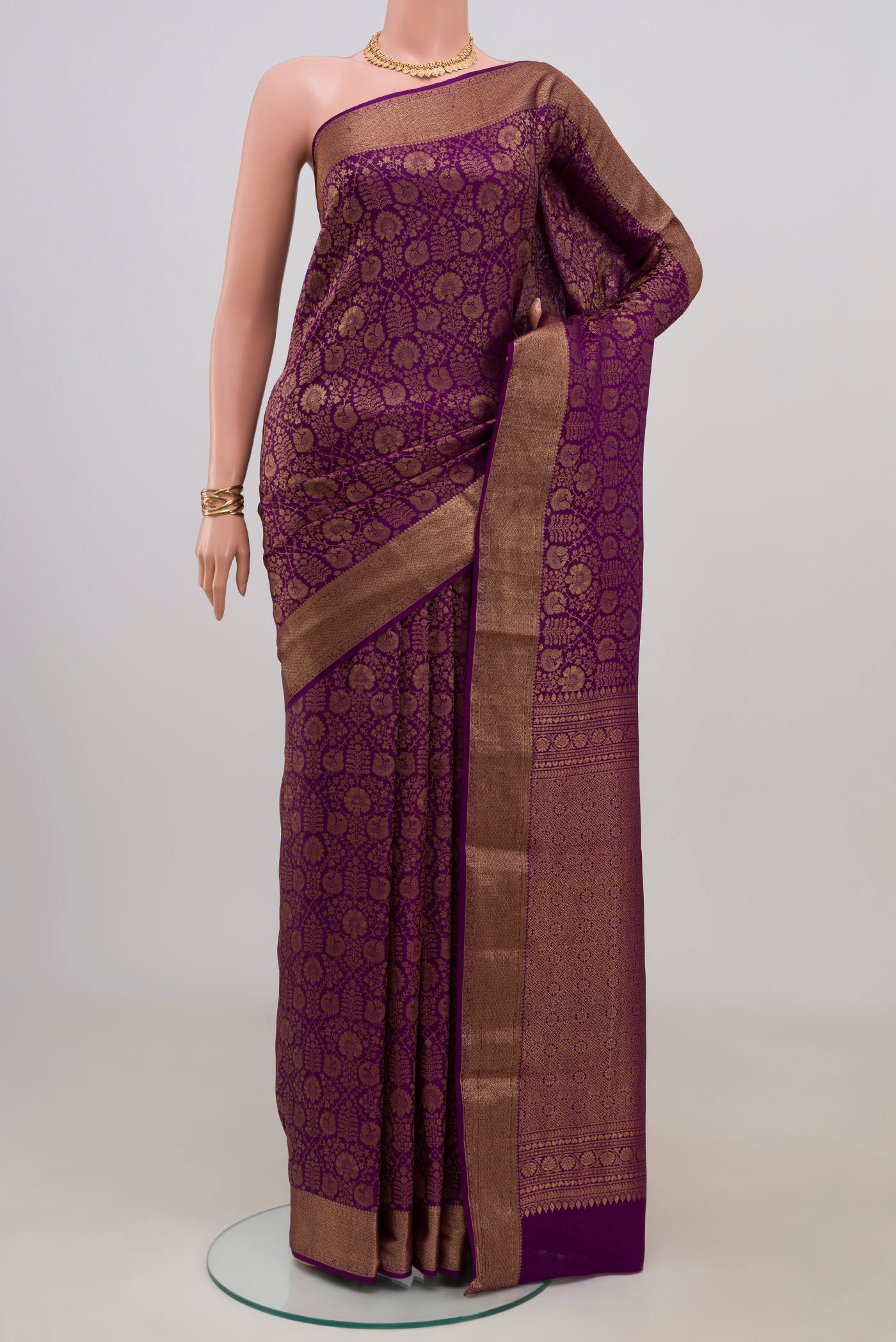 Purple Mysore Crepe Saree with Zari Brocade on the body and Zari Border.  displayed on a mannequin