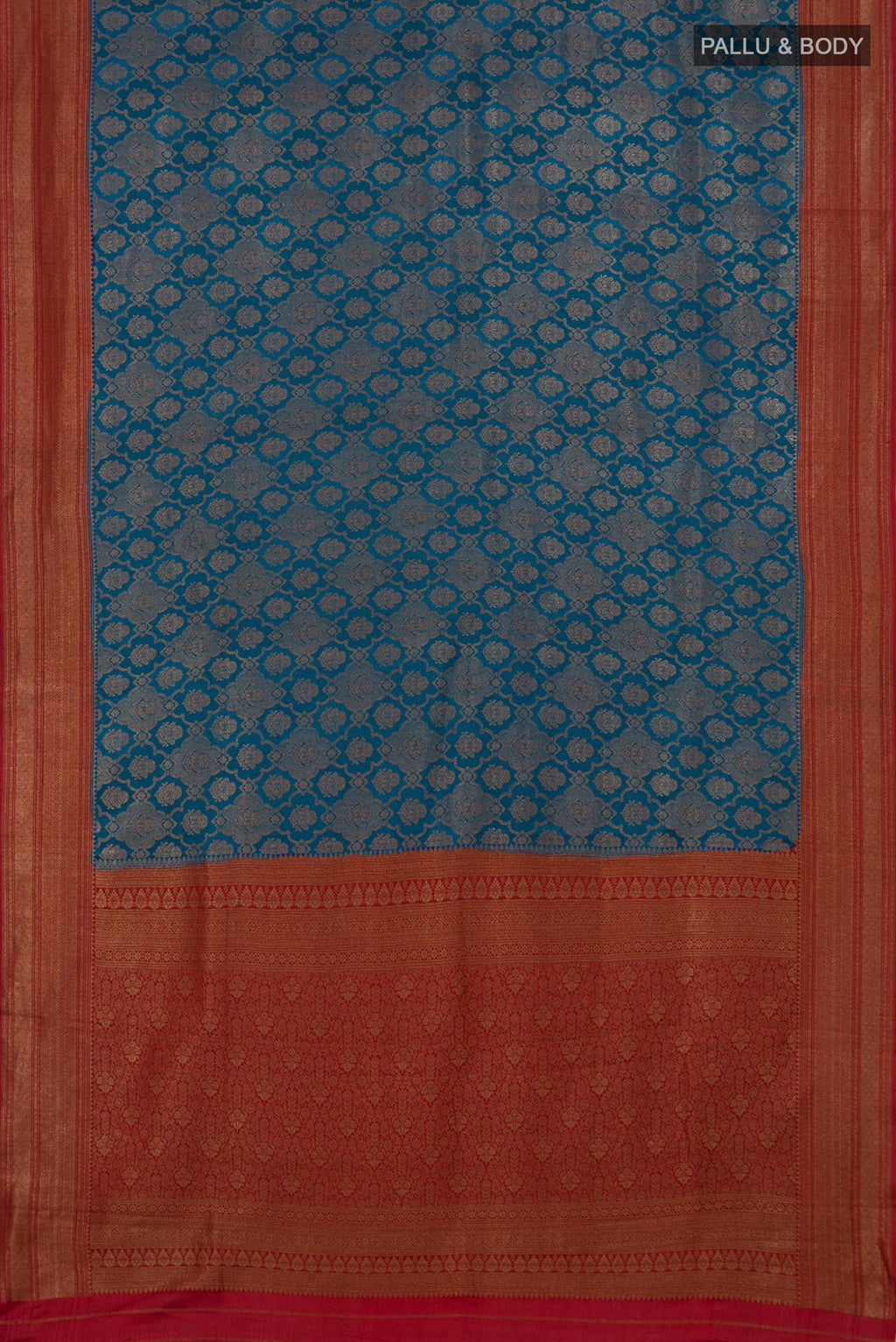 Flat view of Blue Crepe Saree with Zari Brocade on the body and Zari Border. 