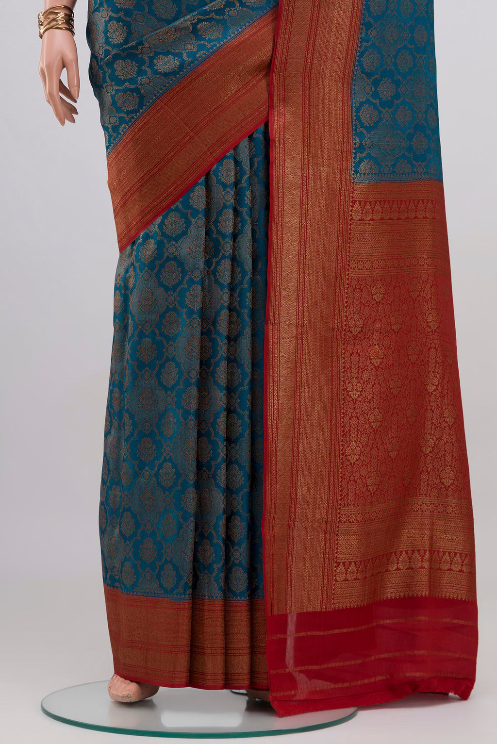 Pleats and pallu of Blue Crepe Saree with Zari Brocade on the body and Zari Border. 