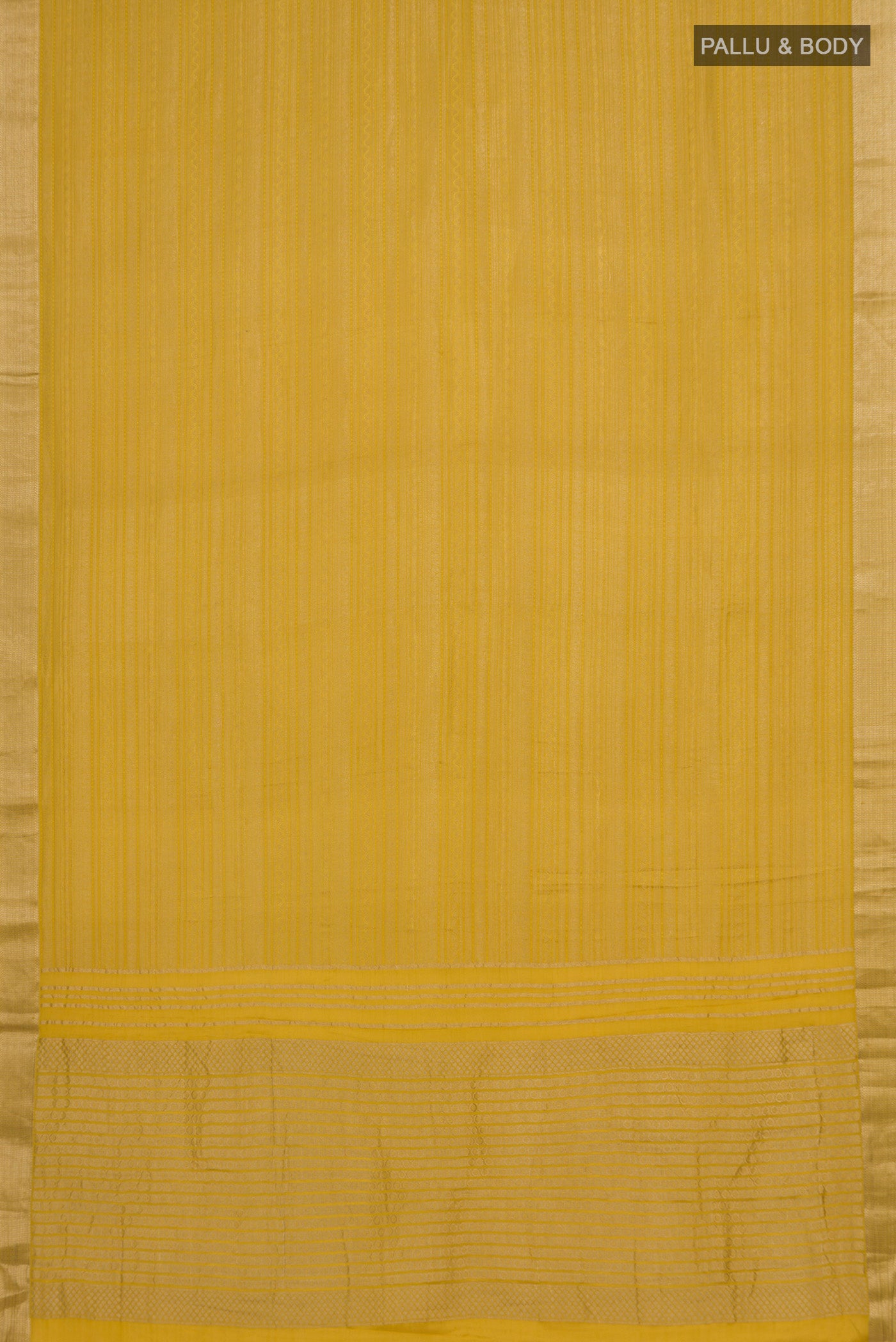 Flat view of Yellow Mysore Crepe Saree with Zari Brocade on the body and Zari Border. 