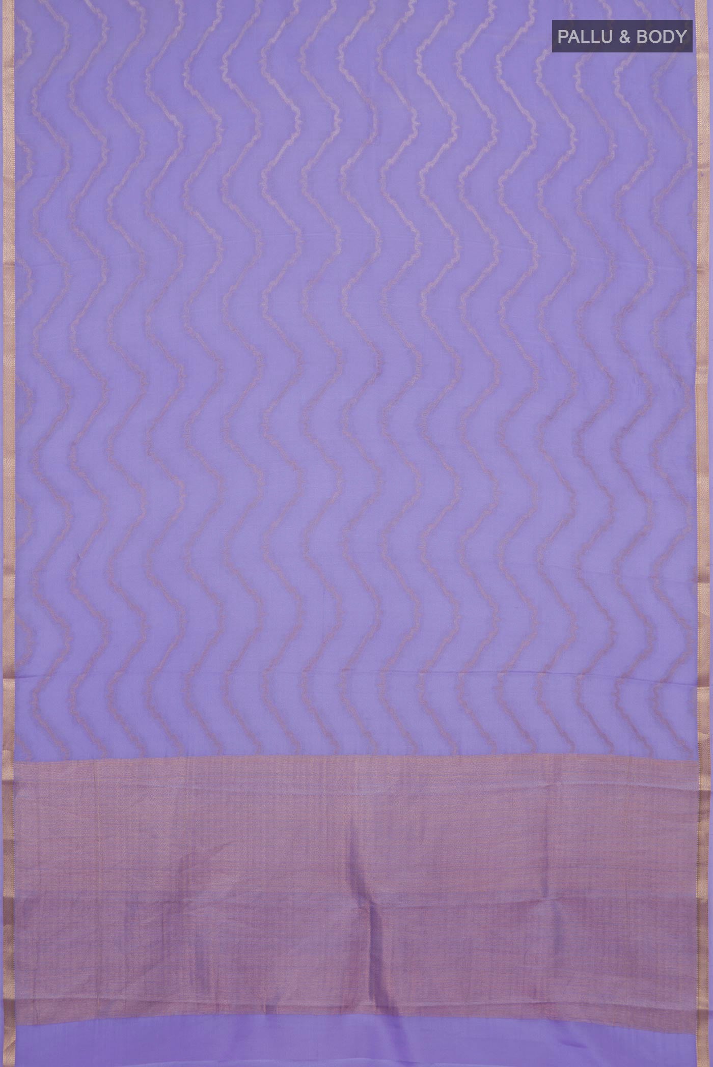 Flat view of Lavender Mysore Crepe Saree with Zig Zag design on the body and Thin Zari Line. 