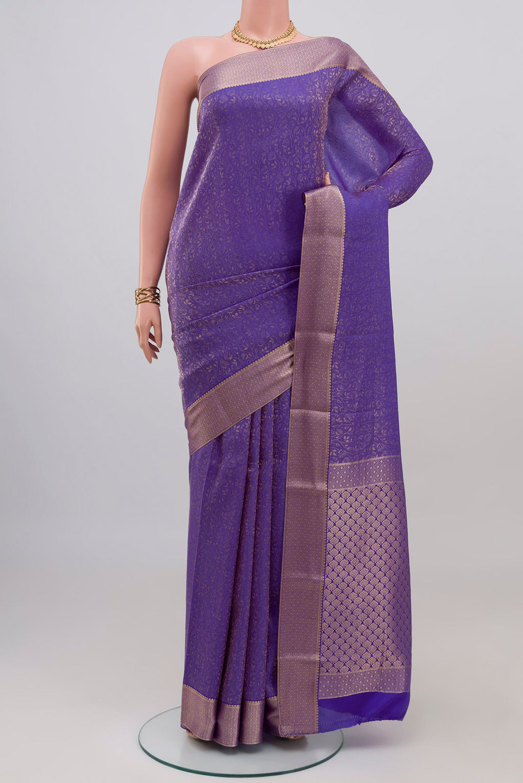 Blue Mysore Crepe Saree with Zari Brocade on the body and Zari Border.  displayed on a mannequin