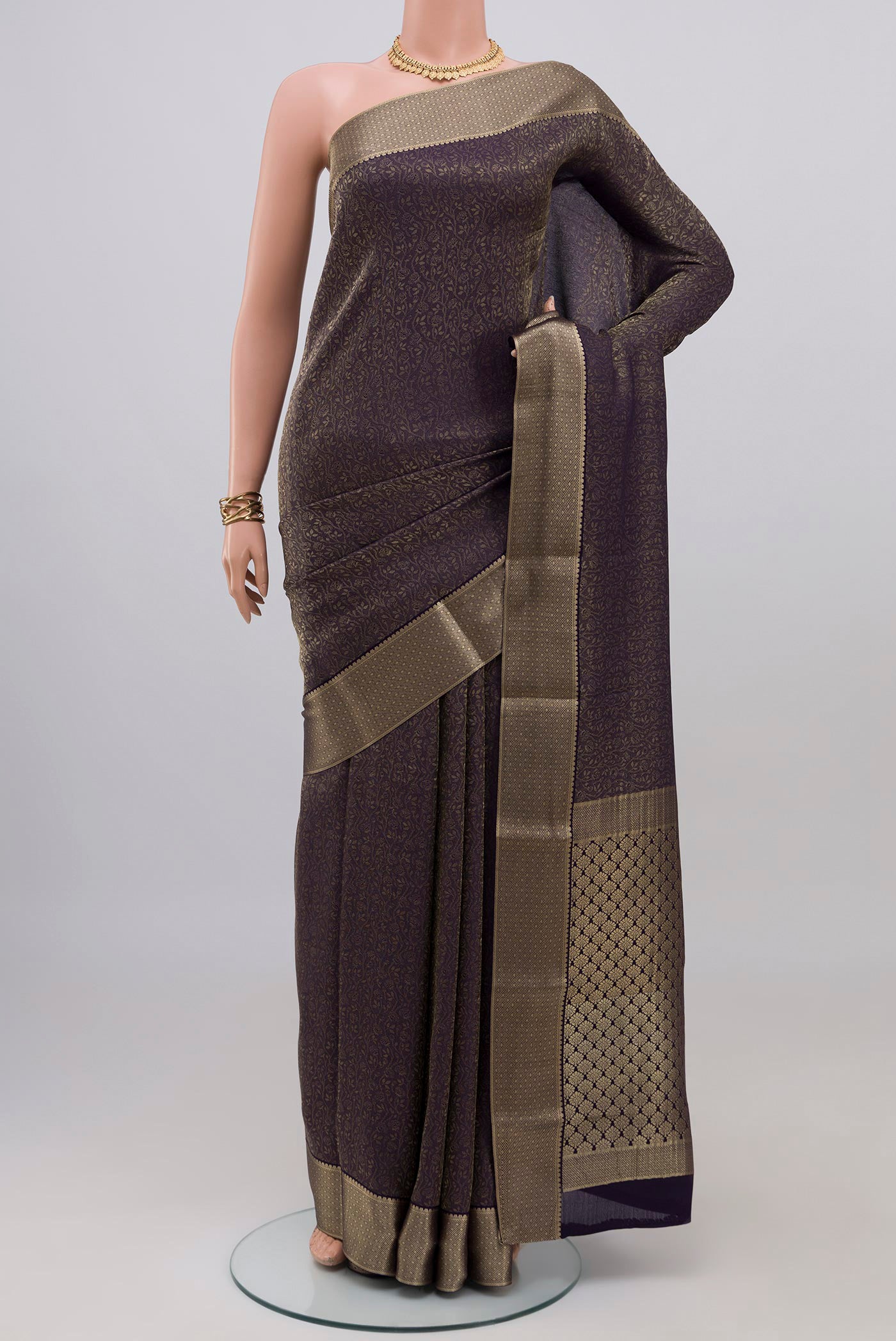Navy Blue Mysore Crepe Saree with Zari Brocade on the body and Zari Border.  displayed on a mannequin