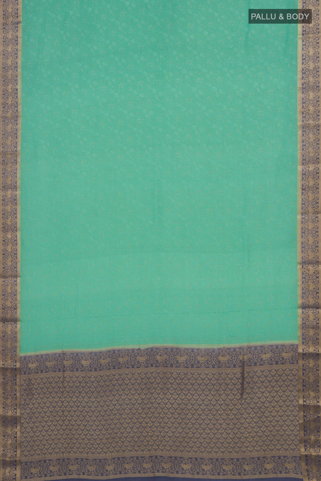 Flat view of Sea Green Mysore Crepe Saree with Zari Brocade on the body and Zari Border. 
