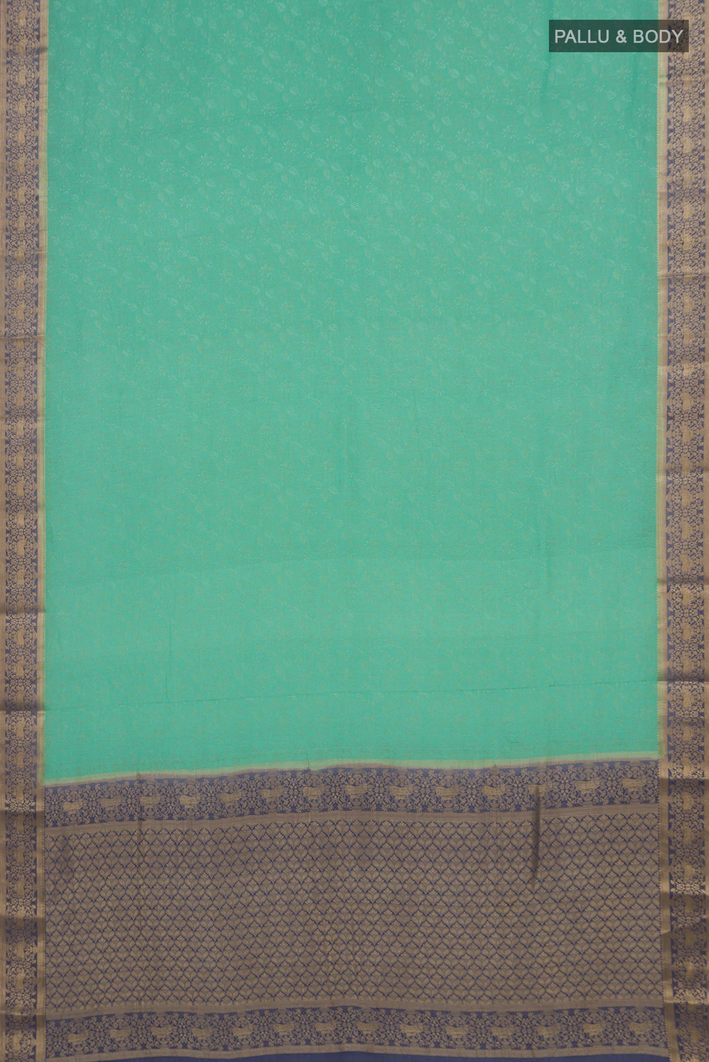 Flat view of Sea Green Mysore Crepe Saree with Zari Brocade on the body and Zari Border. 