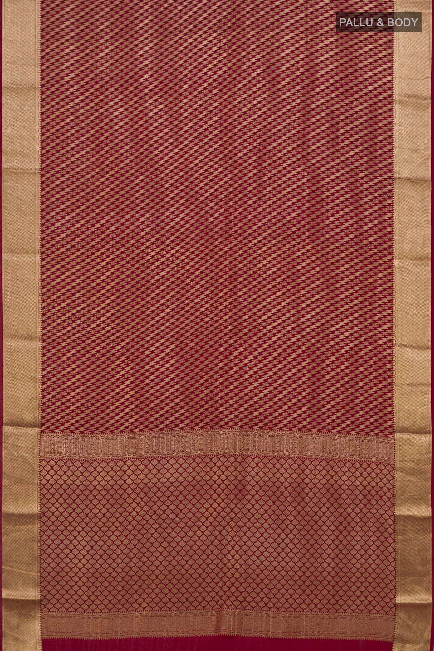 Flat view of Maroon Mysore Crepe Saree with Zari Brocade on the body and Zari Border. 