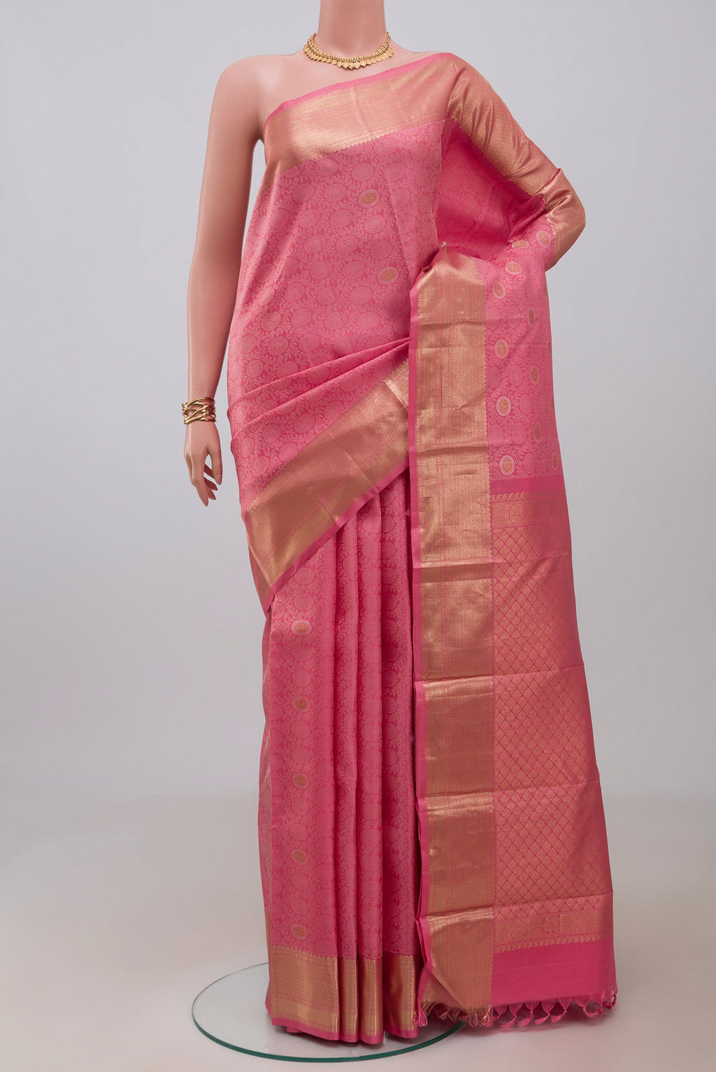 Pink Kanjivaram Silk Saree with Jacquard With Zari Butta on the body and Zari Border.  displayed on a mannequin