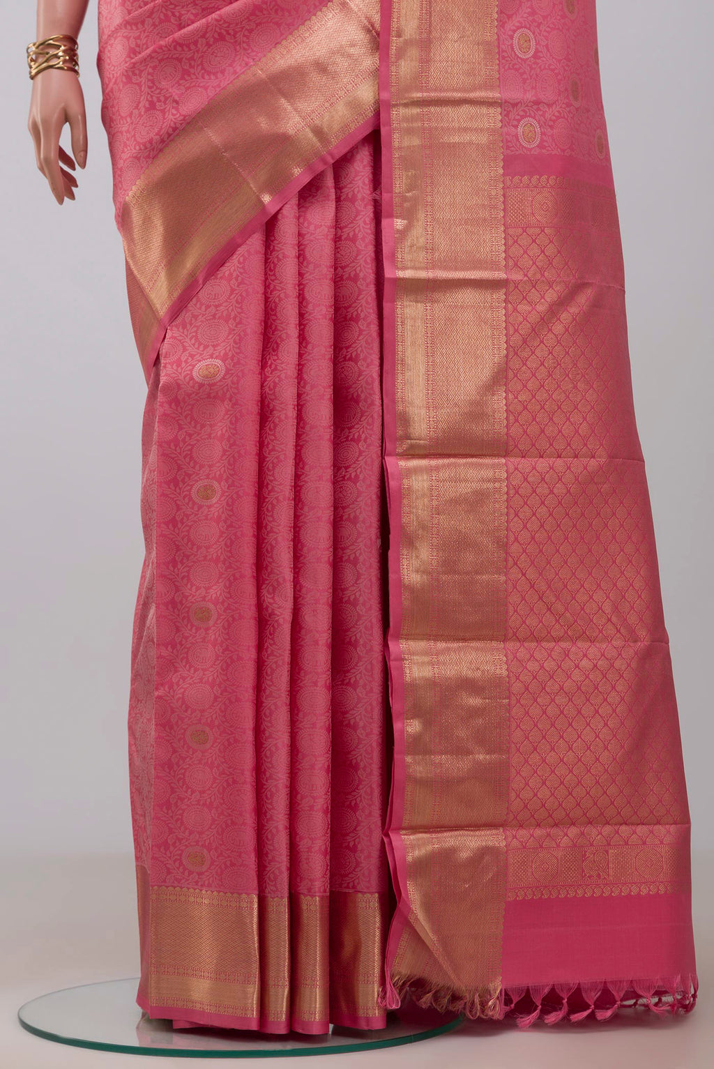 Pleats and pallu of Pink Kanjivaram Silk Saree with Jacquard With Zari Butta on the body and Zari Border. 