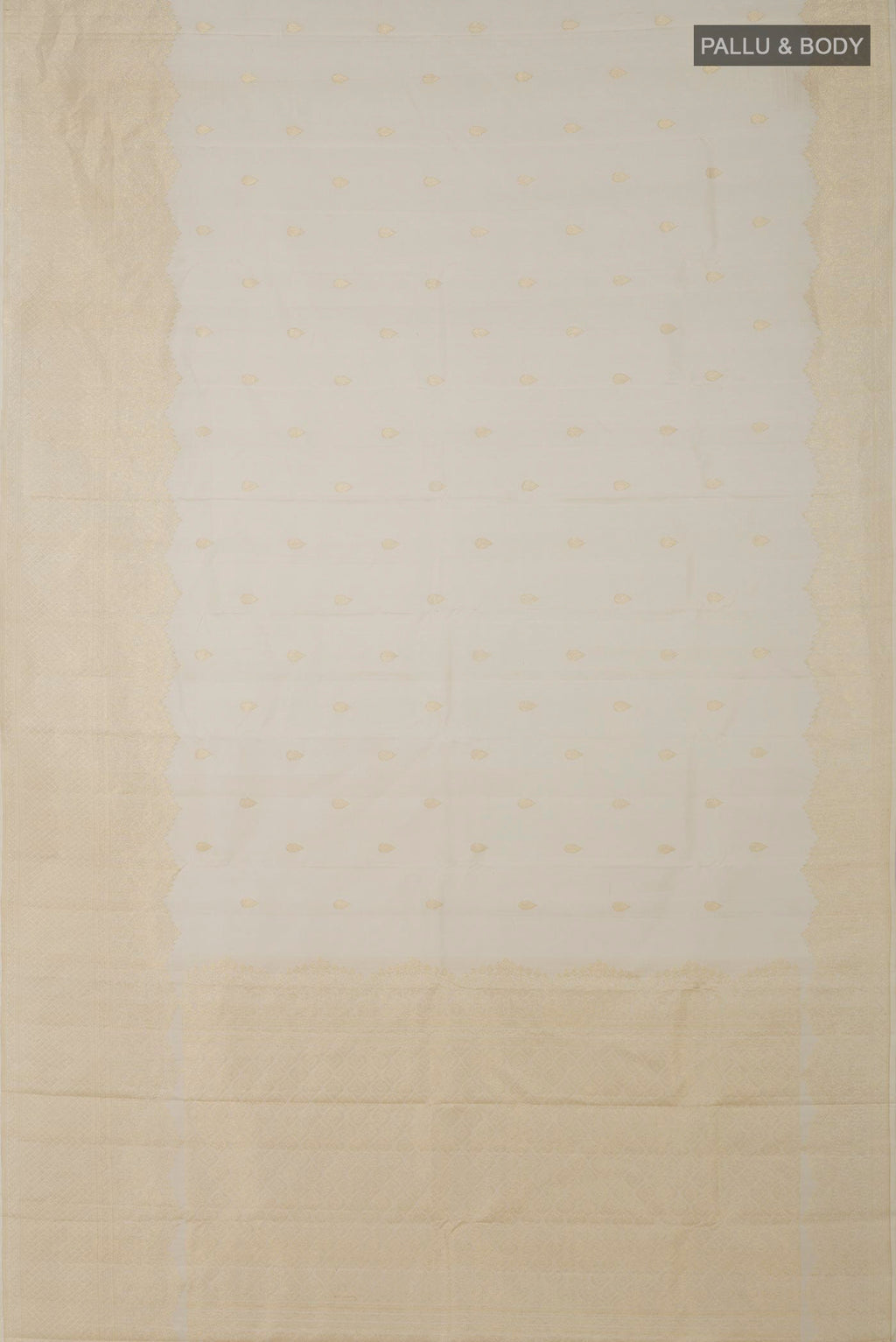 Flat view of Off White Kanjivaram Silk Saree with Zari Butta on the body and Zari Border. 