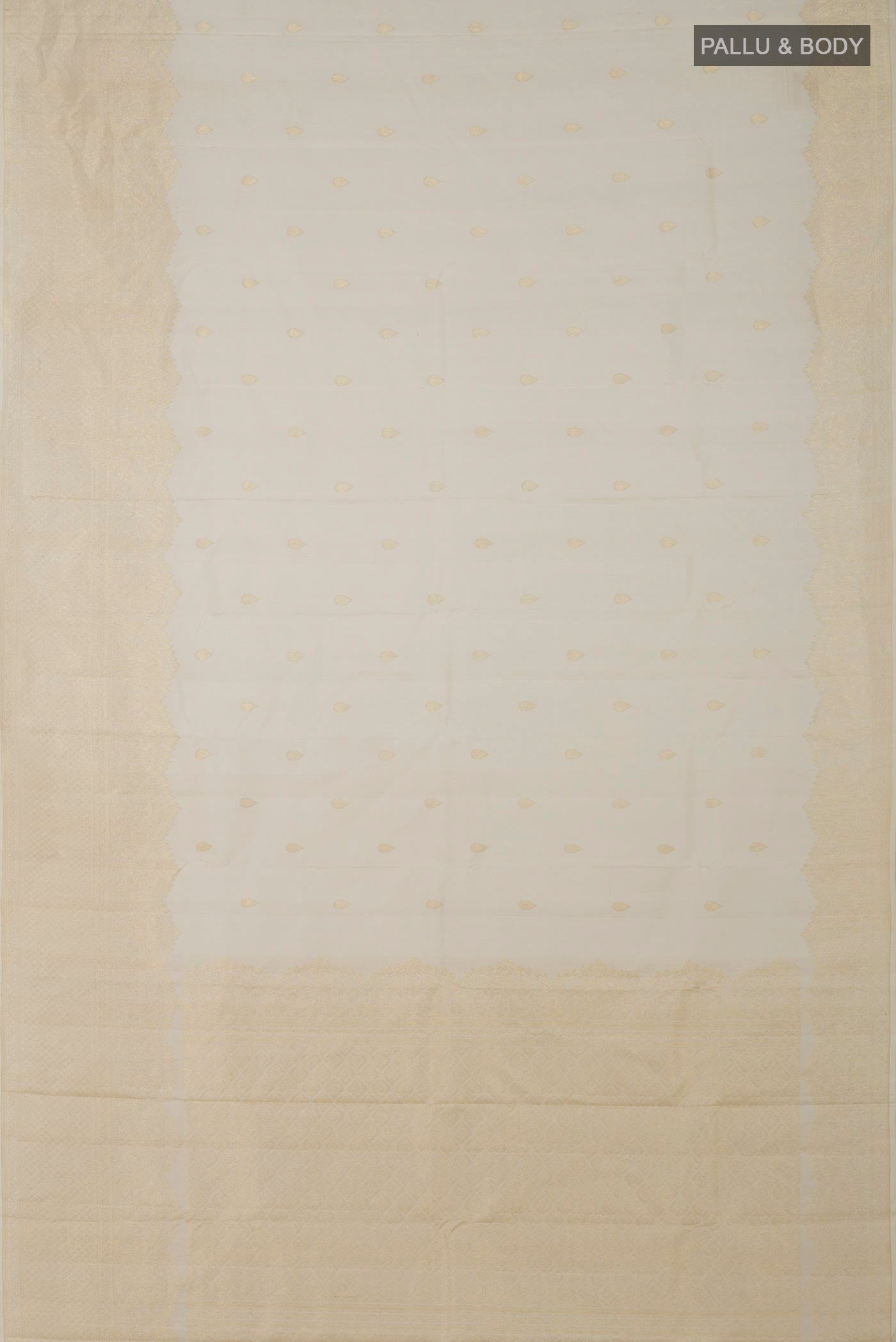 Flat view of Off White Kanjivaram Silk Saree with Zari Butta on the body and Zari Border. 