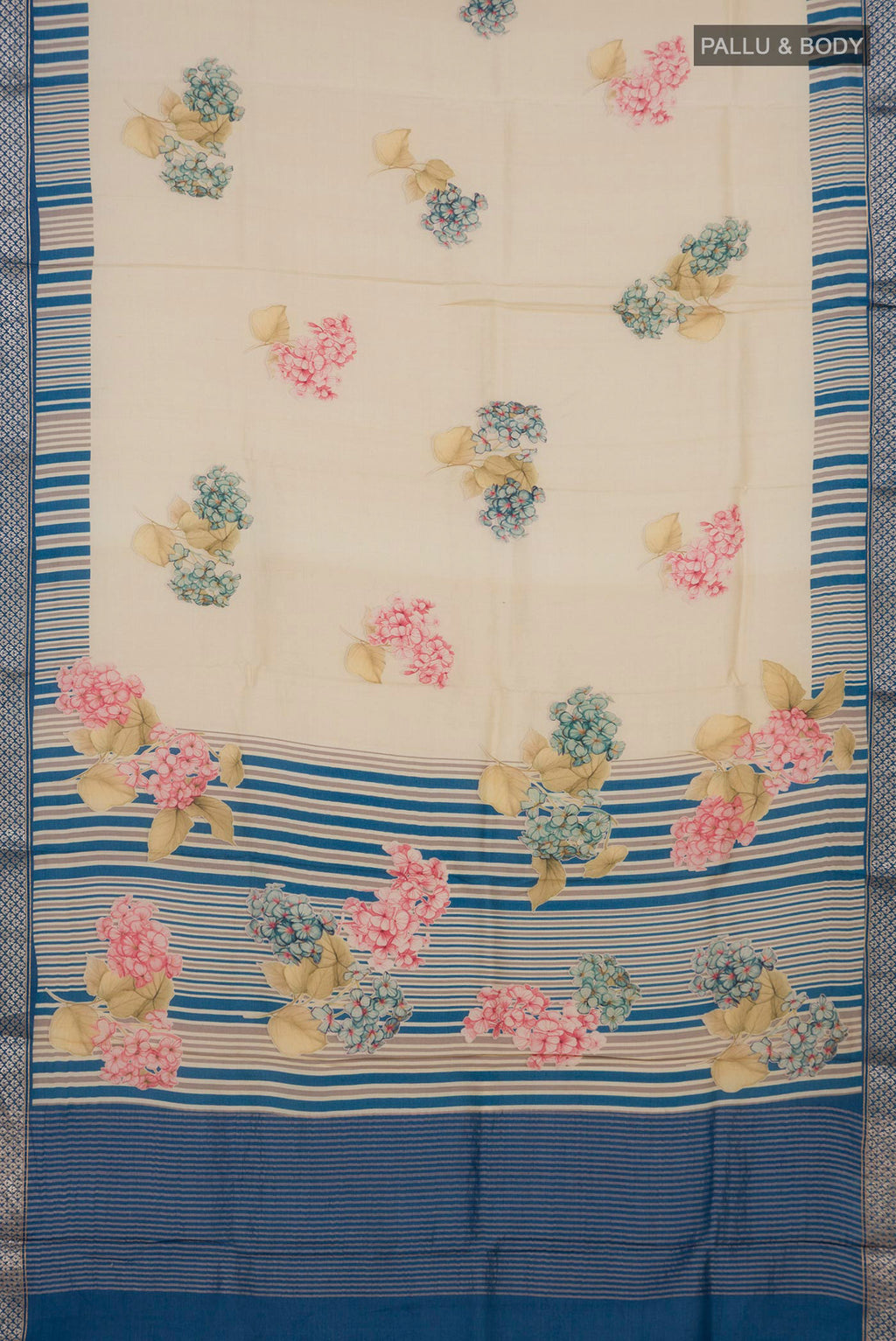 Flat view of Cream Tussar Silk Saree with Floral Print on the body and Zari Border. 