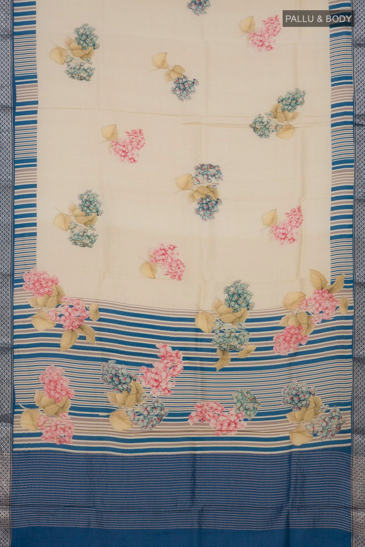 Flat view of Cream Tussar Silk Saree with Floral Print on the body and Zari Border. 