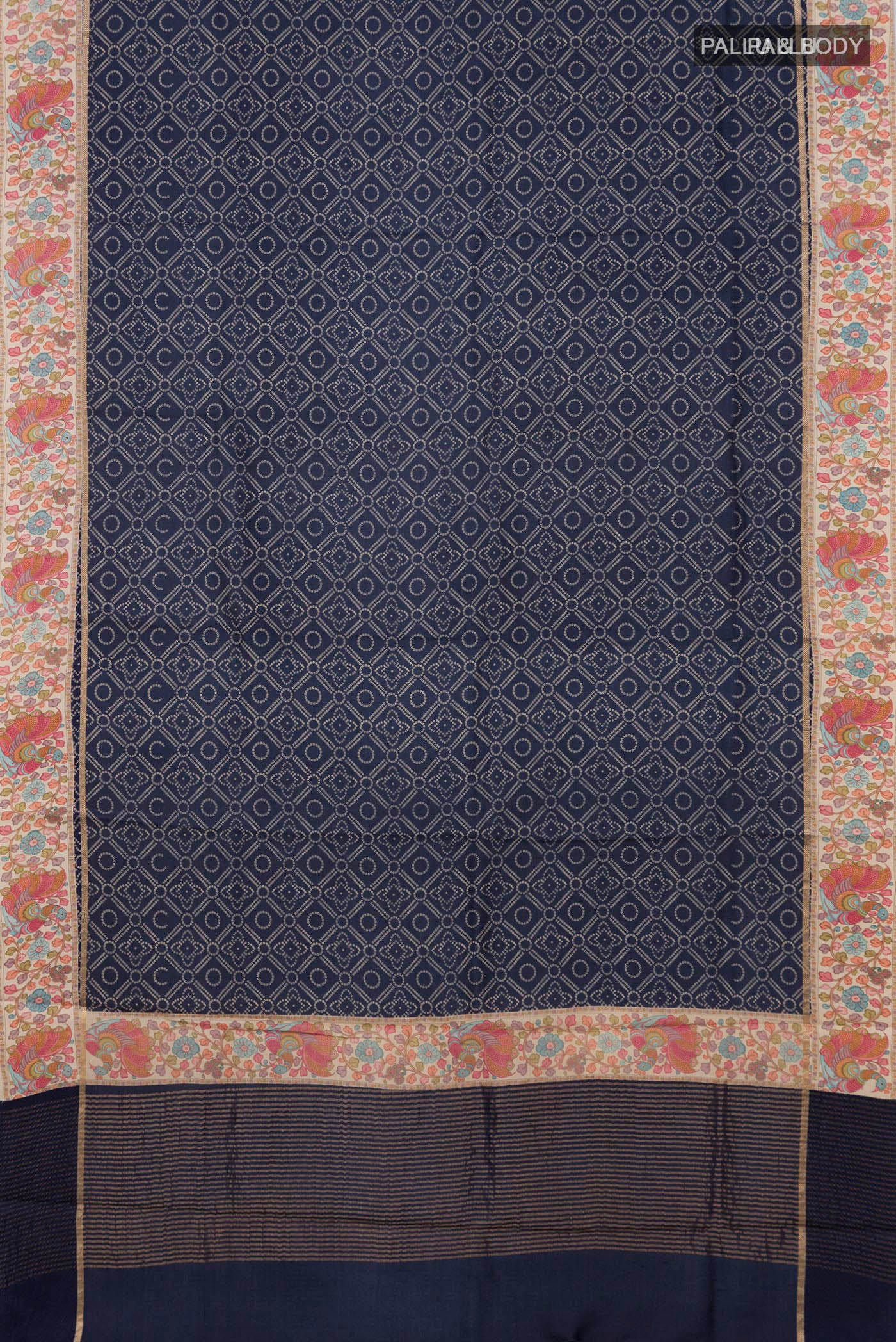 Flat view of Blue Tussar Silk Saree with Printed design on the body and Printed Border. 