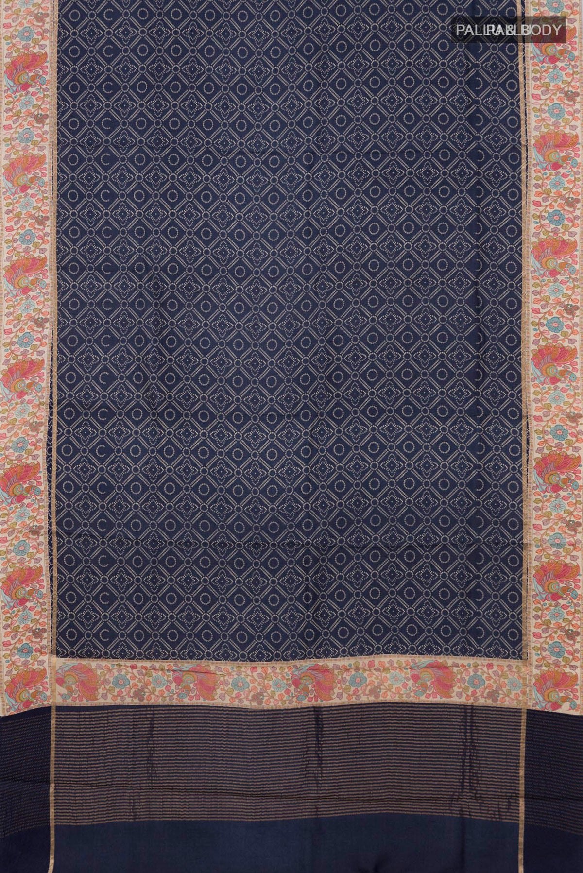 Flat view of Blue Tussar Silk Saree with Printed design on the body and Printed Border. 