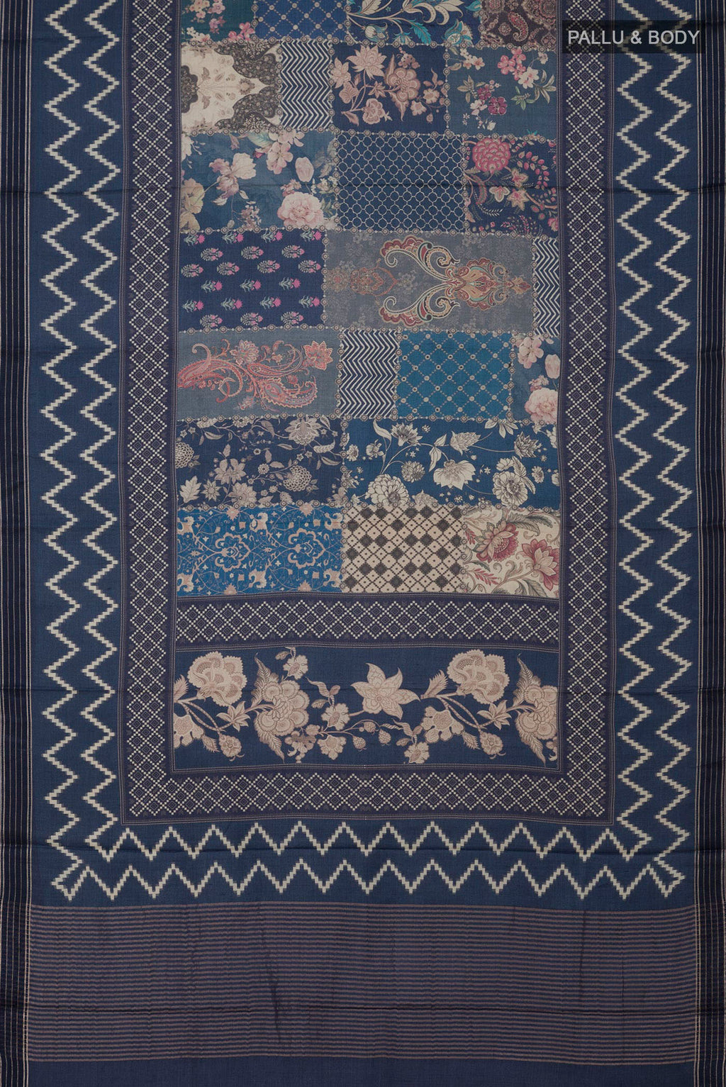 Flat view of Blue Tussar Saree with Printed design on the body and Printed Border. 