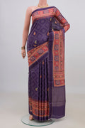 Pure Silk Purple Tussar Saree with Bandhani Print on the body and Printed Border.  displayed on a mannequin