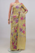 Yellow Tussar Saree with Floral Print on the body and Thin Zari Line.  displayed on a mannequin