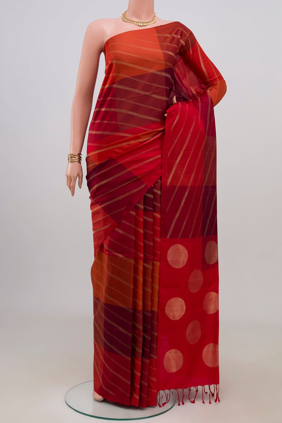 Multi Color Soft Silk Saree with Fancy on the body and Without Border.  displayed on a mannequin