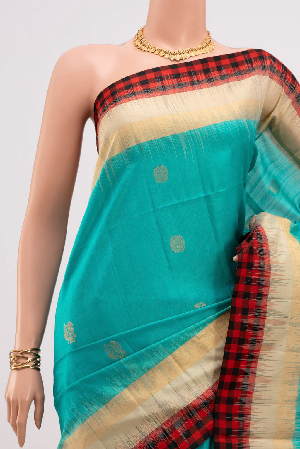 Border image of Blue Soft Silk Saree with Zari Butta on the body and Thin Zari Line. 