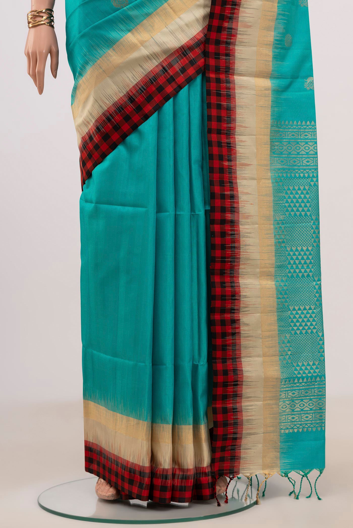 Pleats and pallu of Blue Soft Silk Saree with Zari Butta on the body and Thin Zari Line. 