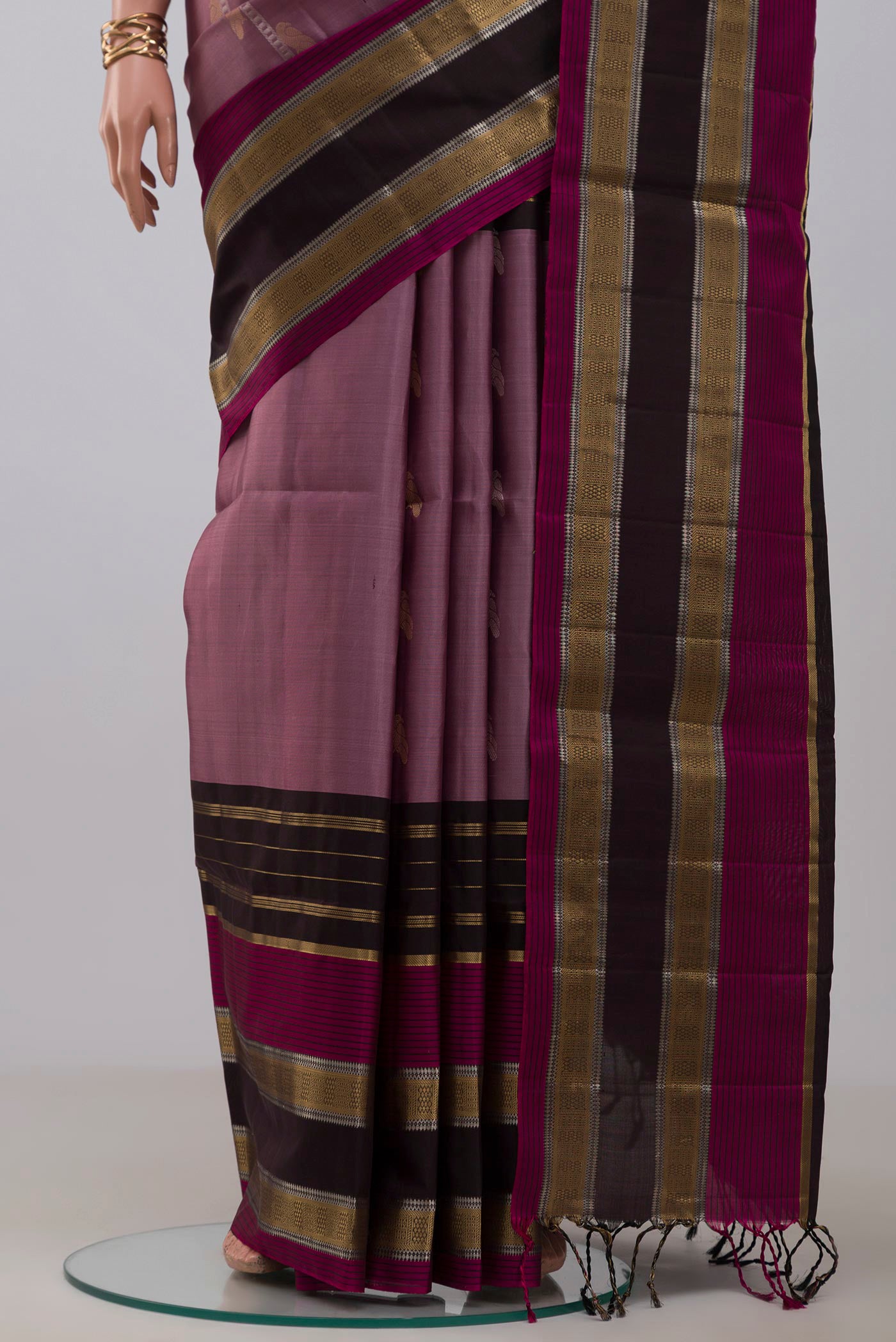 Pleats and pallu of Lavender Soft Silk Saree with Fancy on the body and Fancy Border. 