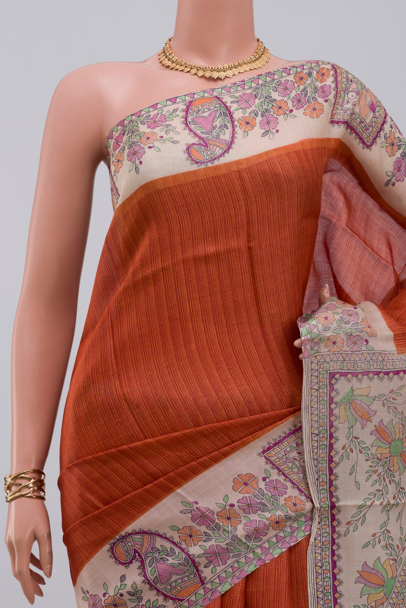 Border image of Orange Printed Silk Saree with Printed design on the body and Printed Border. 