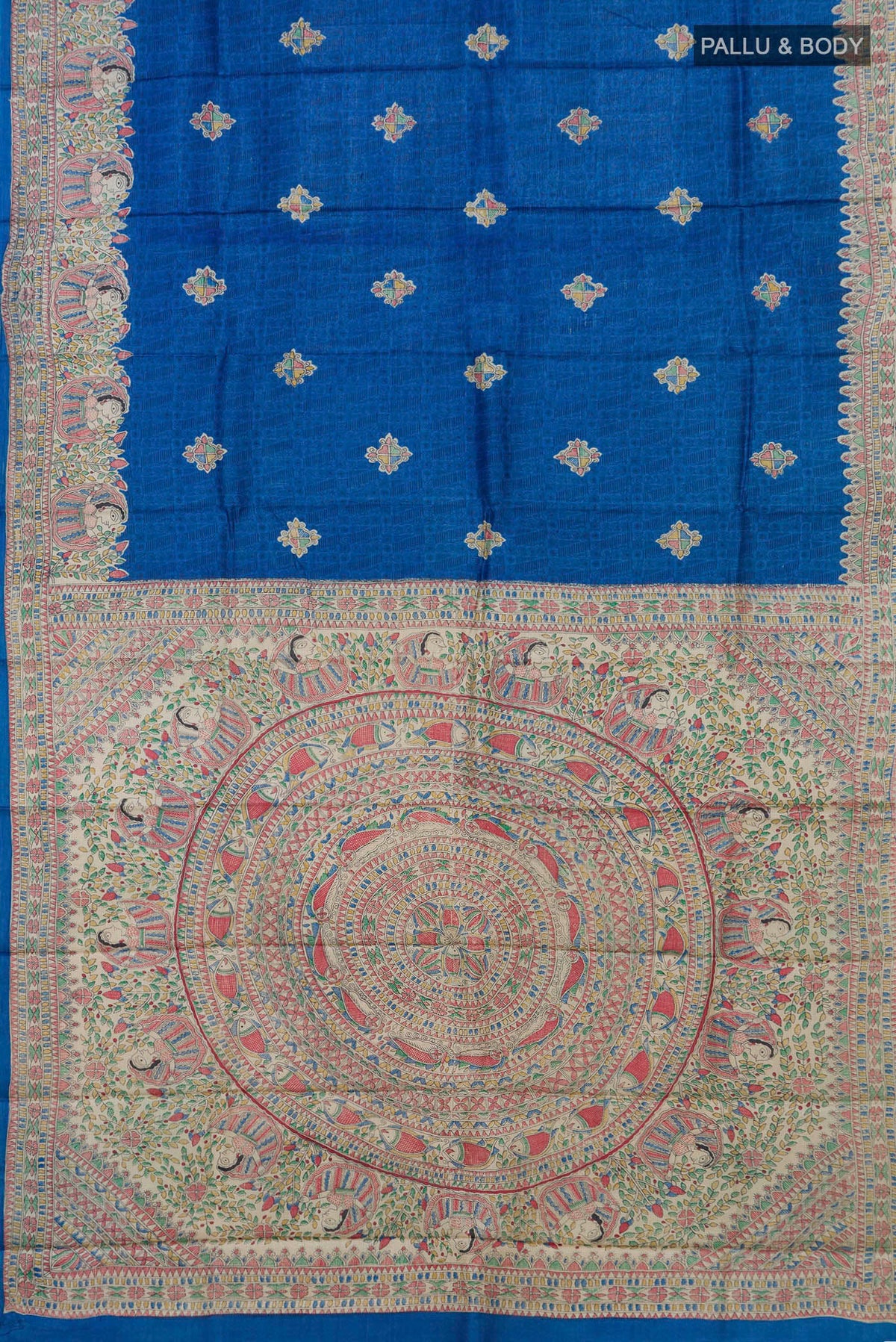 Flat view of Blue Tussar Saree with Printed design on the body and Printed Border. 