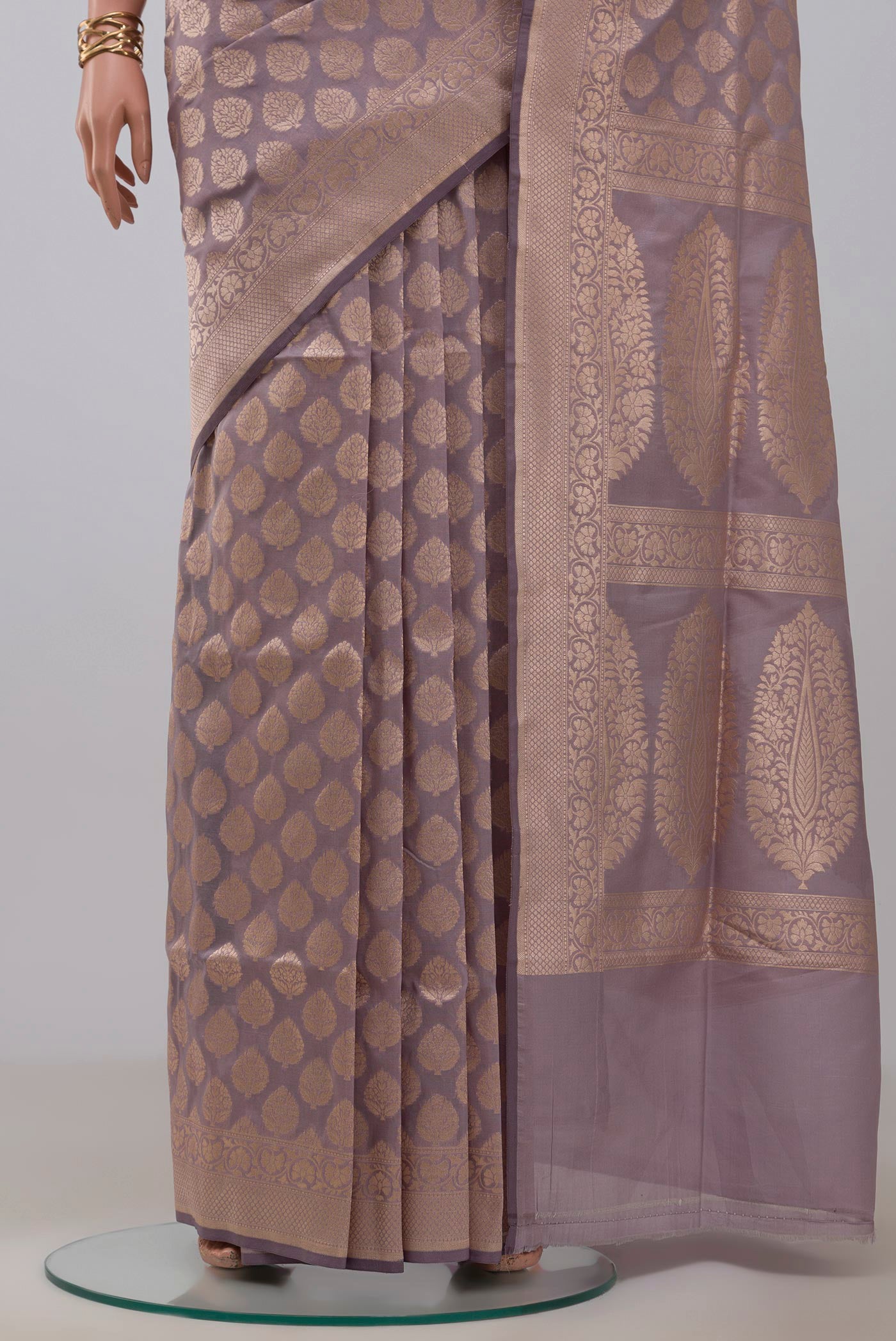 Pleats and pallu of Lavender Banarasi Silk Saree with Zari Brocade on the body and Zari Border. 