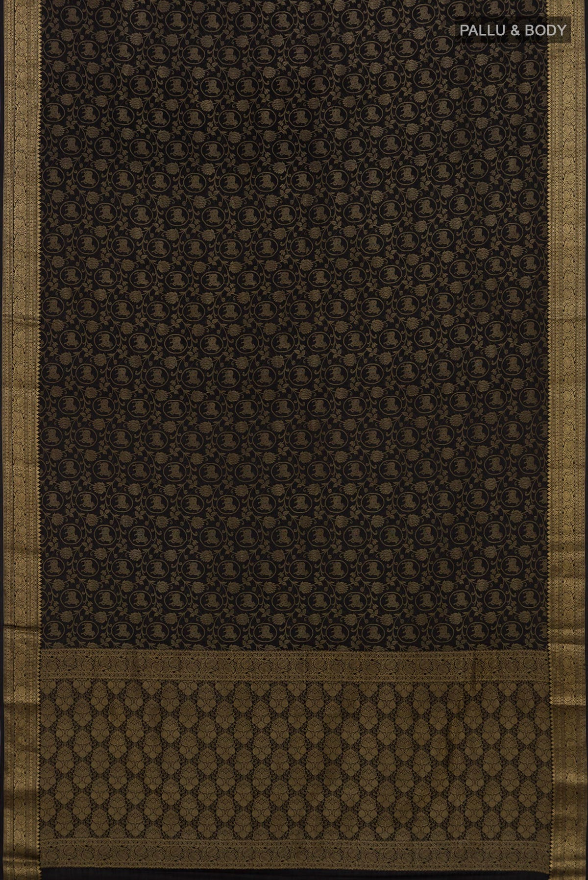 Flat view of Black Mysore Crepe Saree with Zari Brocade on the body and Fancy Border. 