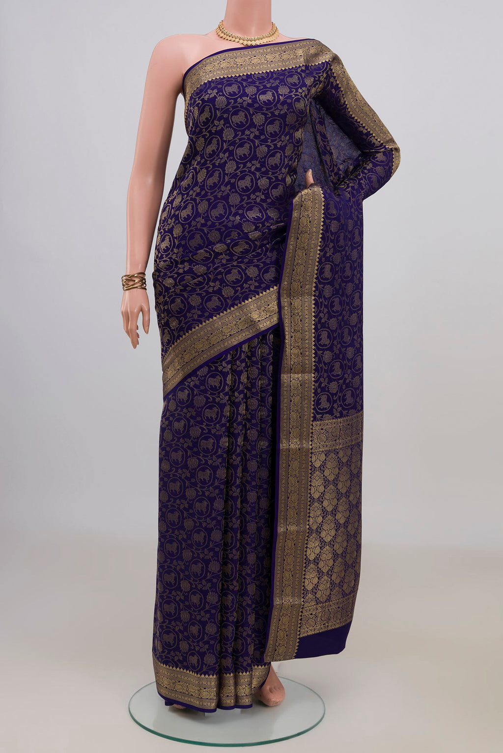 Blue Mysore Crepe Saree with Zari Brocade on the body and Zari Border.  displayed on a mannequin