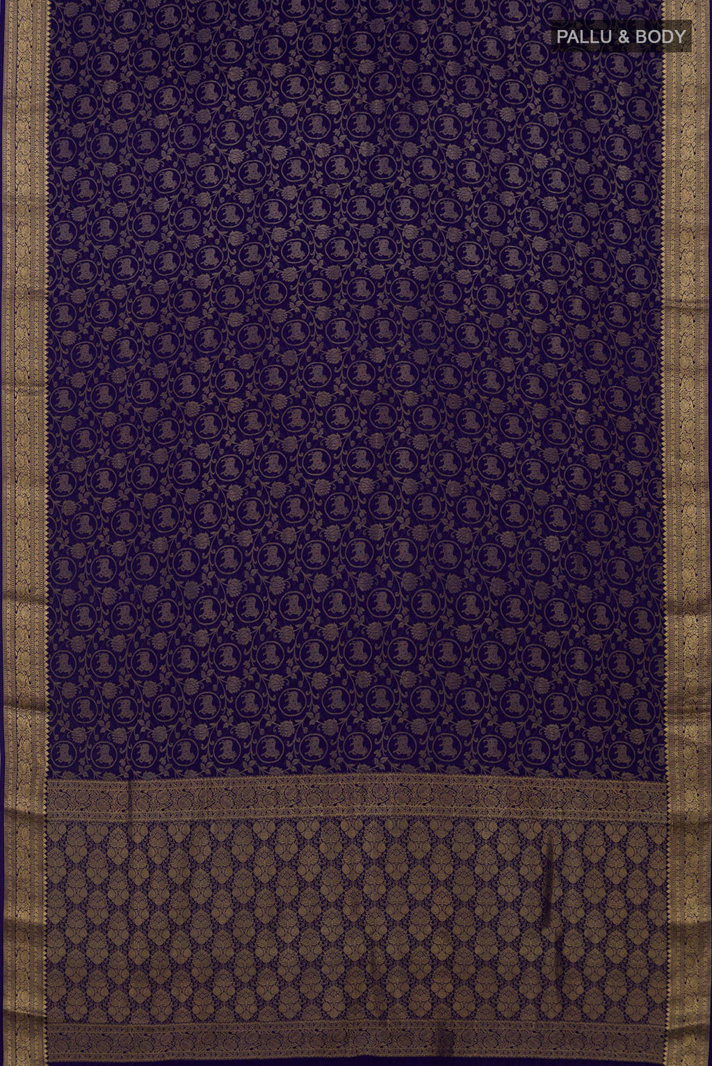 Flat view of Blue Mysore Crepe Saree with Zari Brocade on the body and Zari Border. 