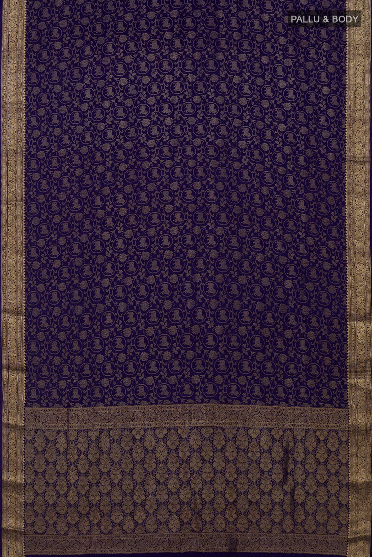 Flat view of Blue Mysore Crepe Saree with Zari Brocade on the body and Zari Border. 