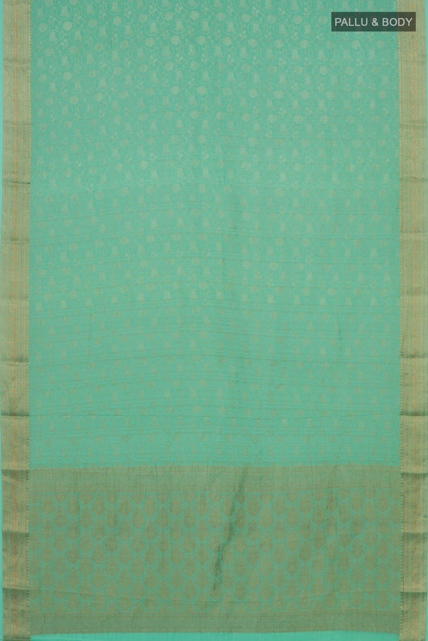 Flat view of Sea Green Mysore Crepe Saree with Zari Brocade on the body and Zari Border. 