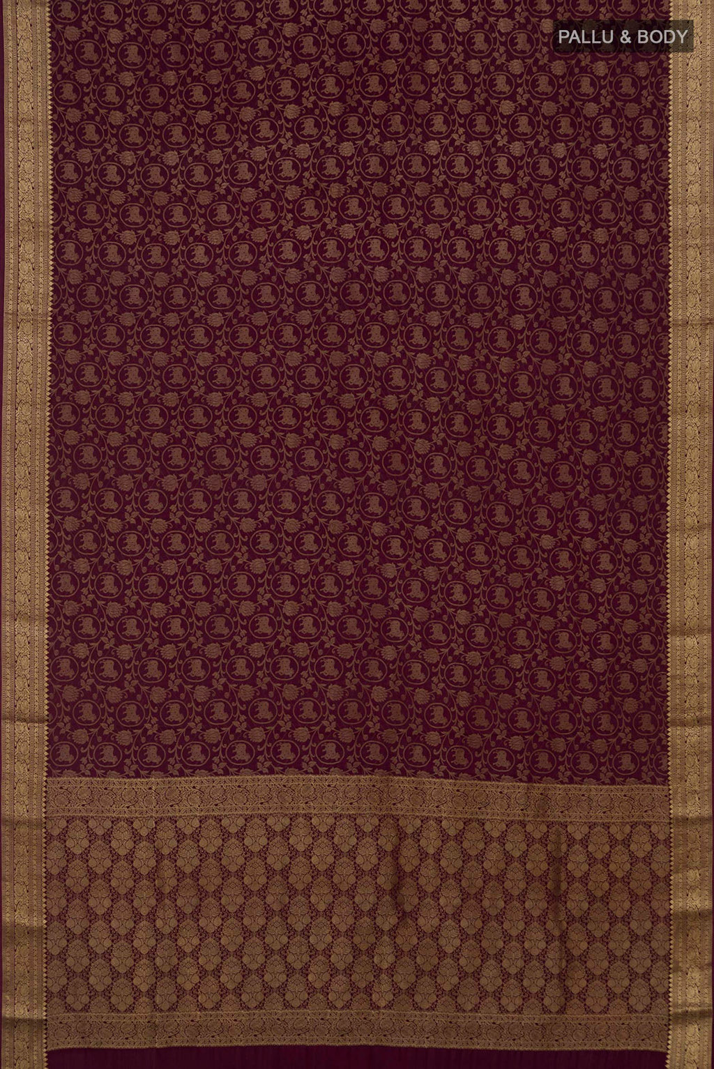 Flat view of Purple Mysore Crepe Saree with Zari Brocade on the body and Zari Border. 