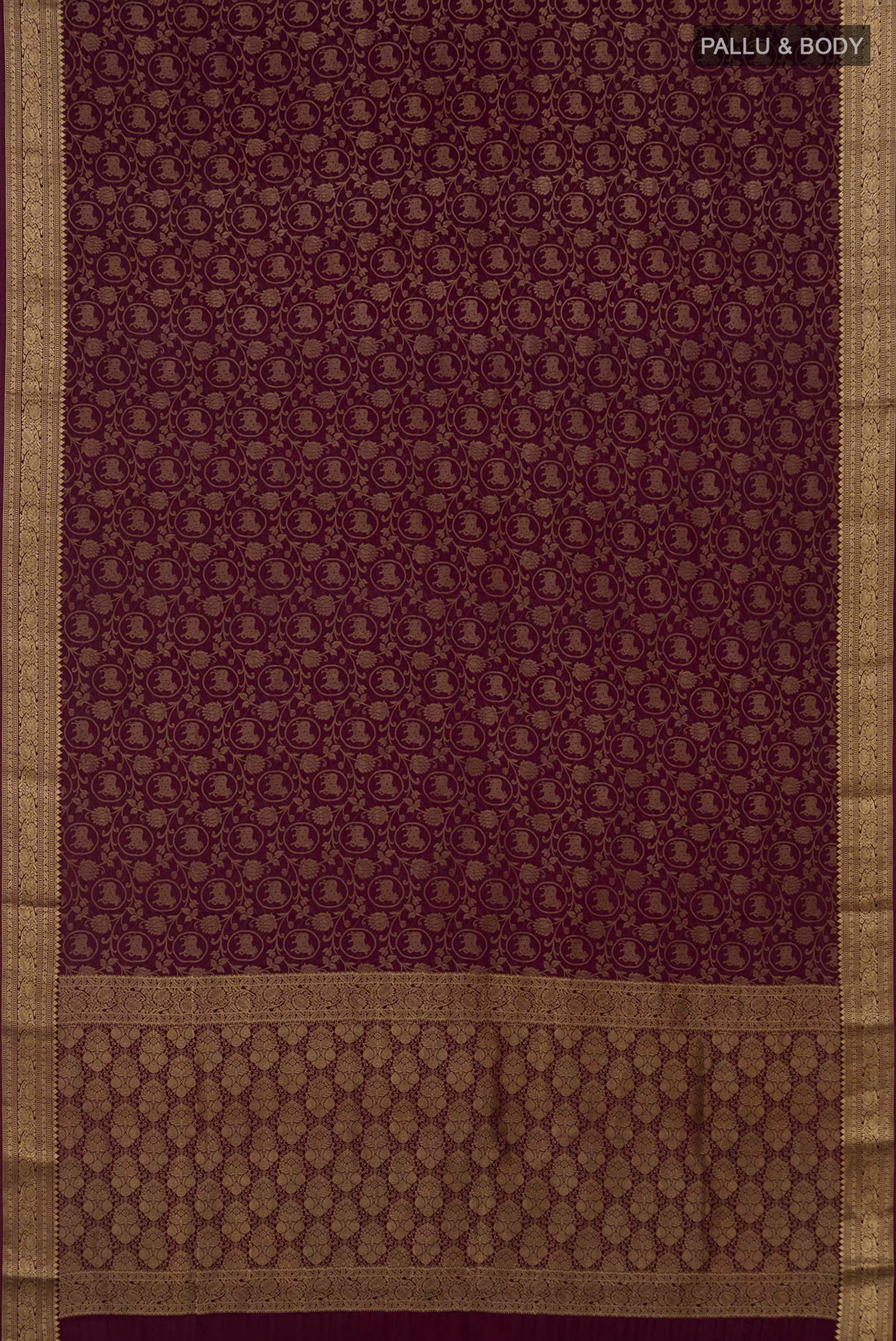 Flat view of Purple Mysore Crepe Saree with Zari Brocade on the body and Zari Border. 