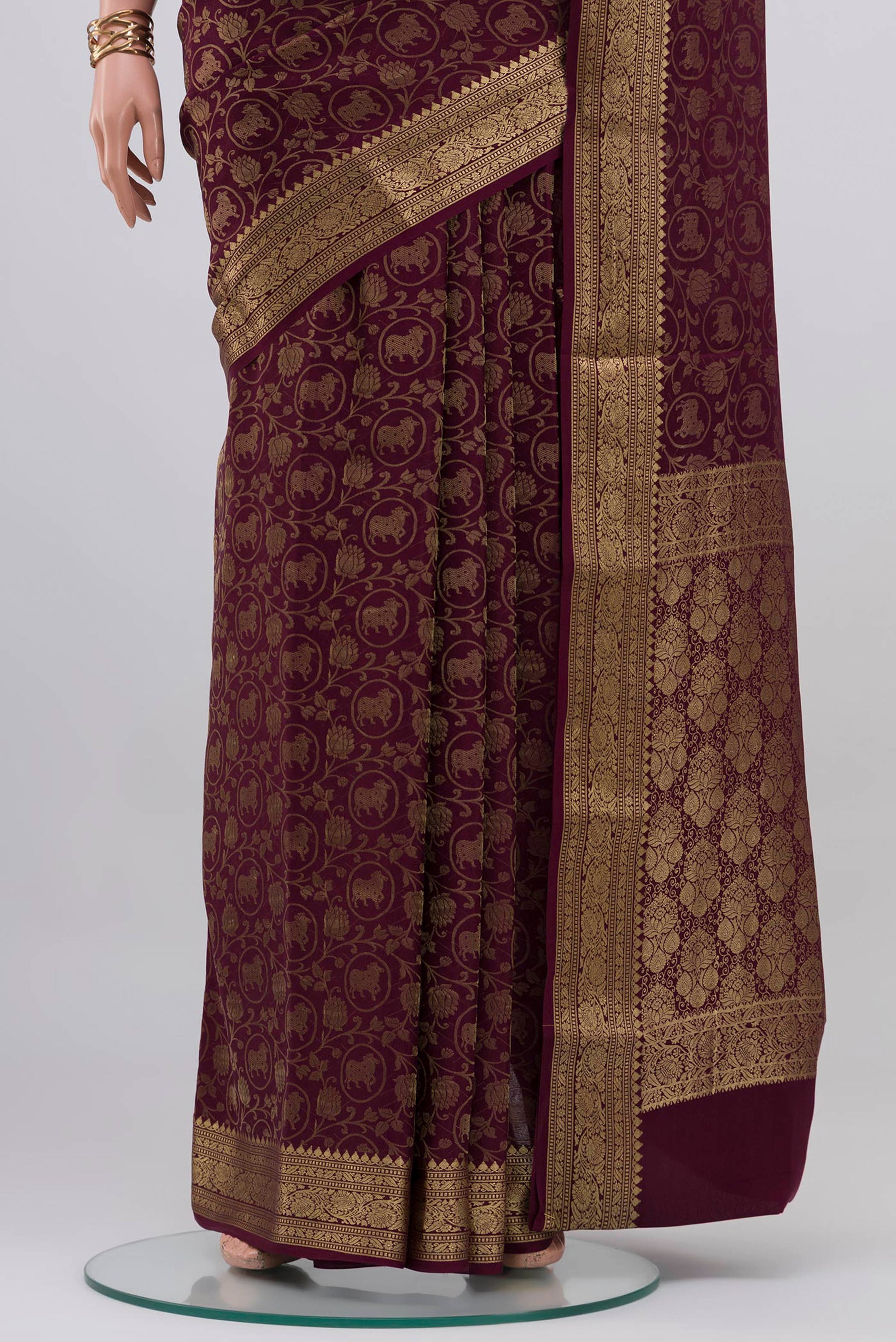 Pleats and pallu of Purple Mysore Crepe Saree with Zari Brocade on the body and Zari Border. 