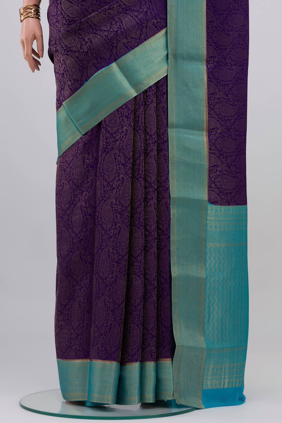 Pleats and pallu of Navy Blue Mysore Crepe Saree with Zari Brocade on the body and Zari Border. 