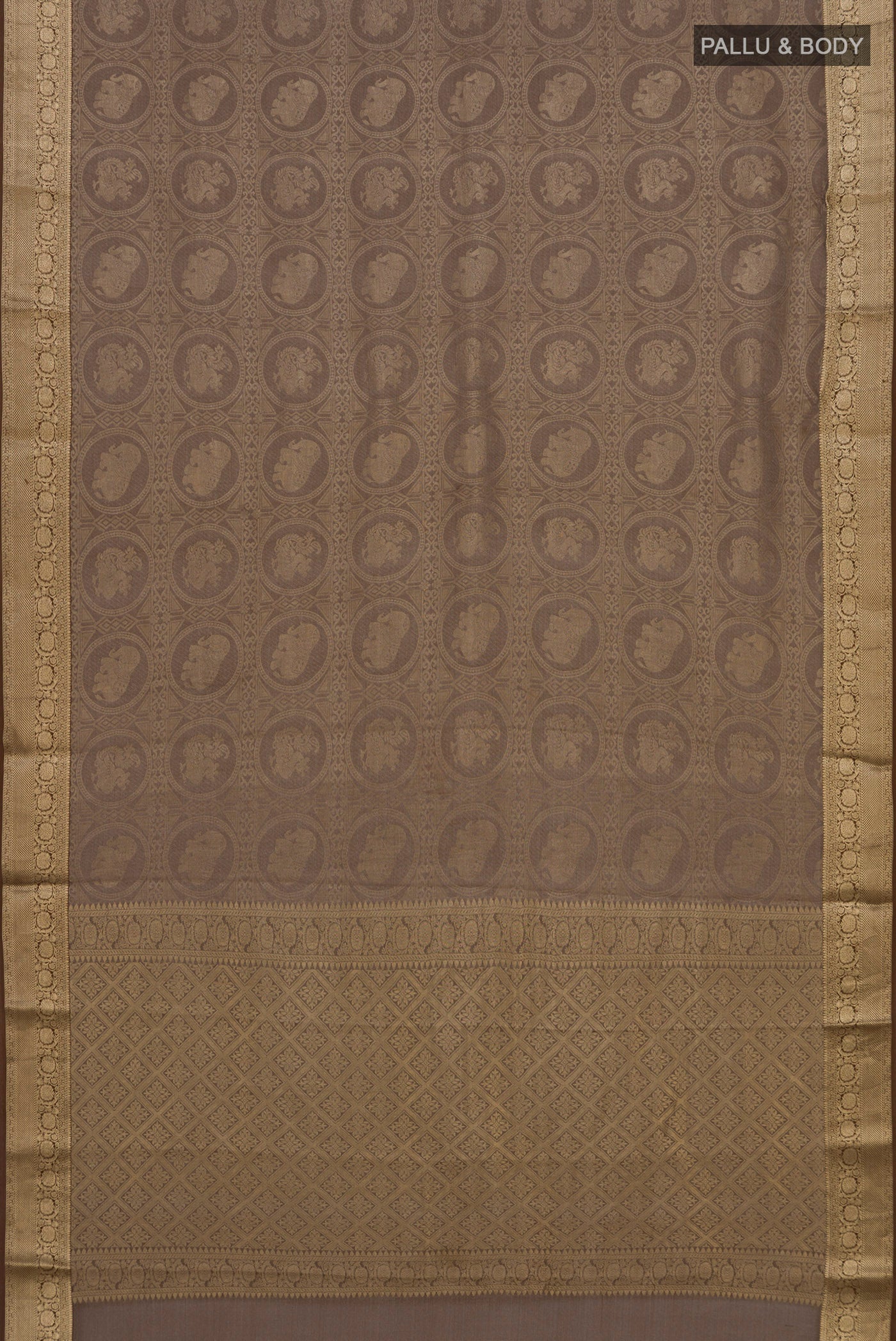 Flat view of Brown Mysore Crepe Saree with Zari Brocade on the body and Zari Border. 