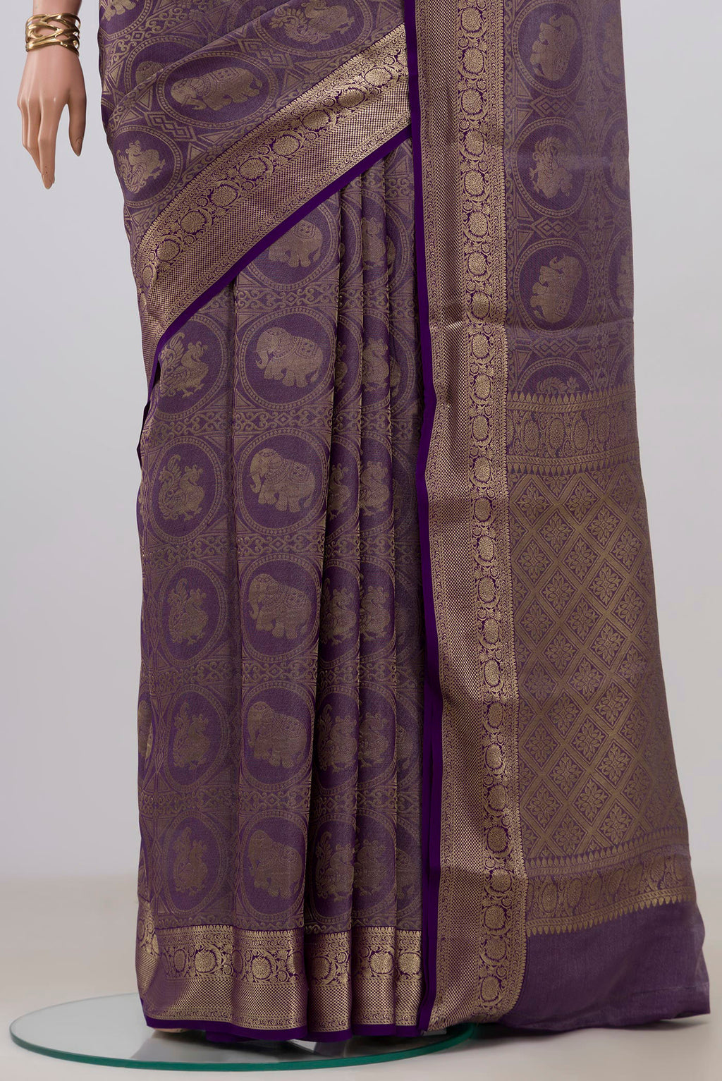 Pleats and pallu of Violet Mysore Crepe Saree with Zari Brocade on the body and Zari Border. 