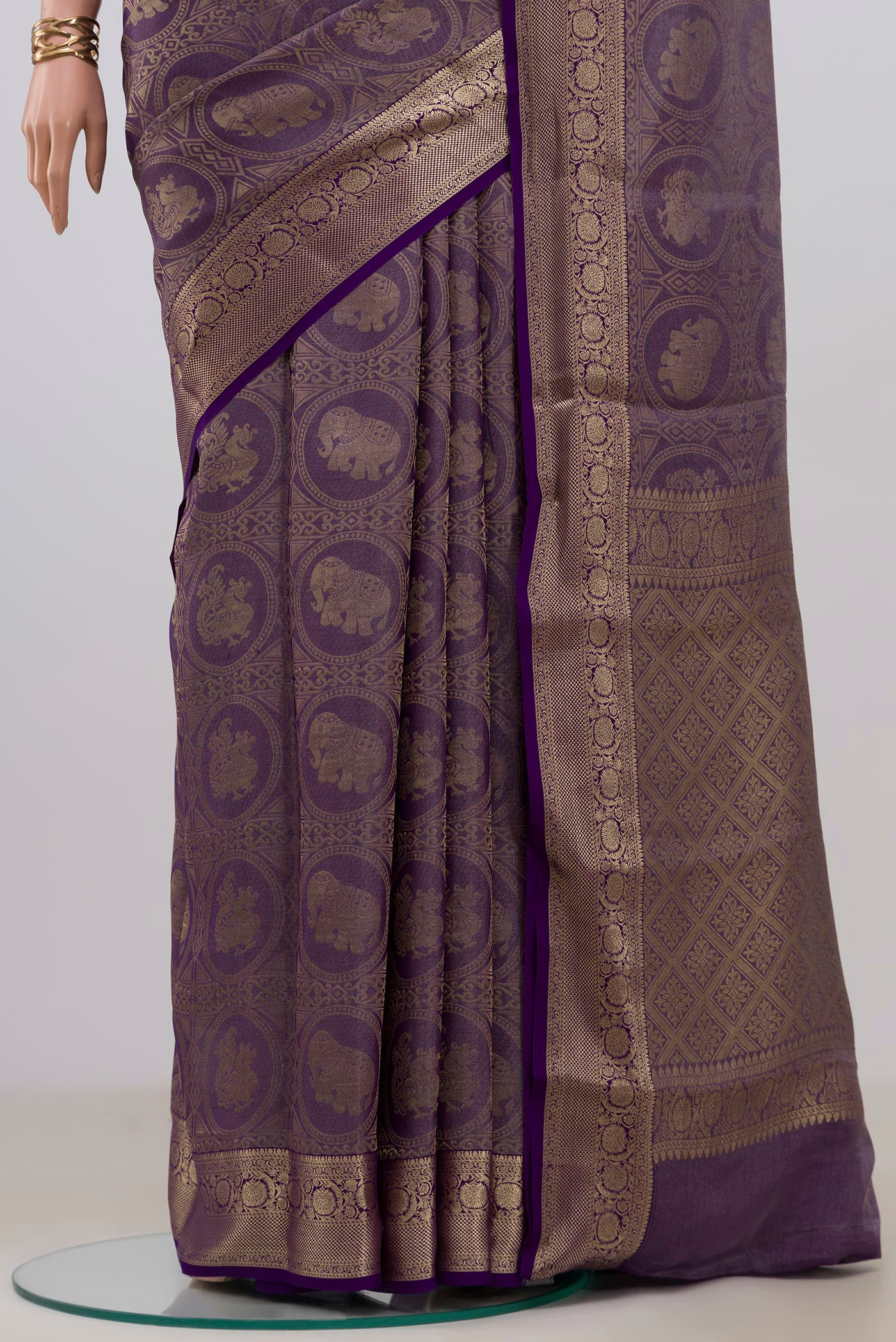 Pleats and pallu of Violet Mysore Crepe Saree with Zari Brocade on the body and Zari Border. 
