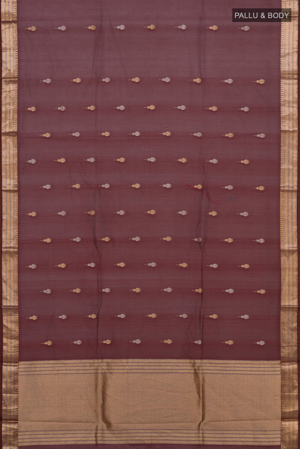 Flat view of Coffee Brown Banarasi Kora Cotton Saree with Zari Butta on the body and Zari Border. 