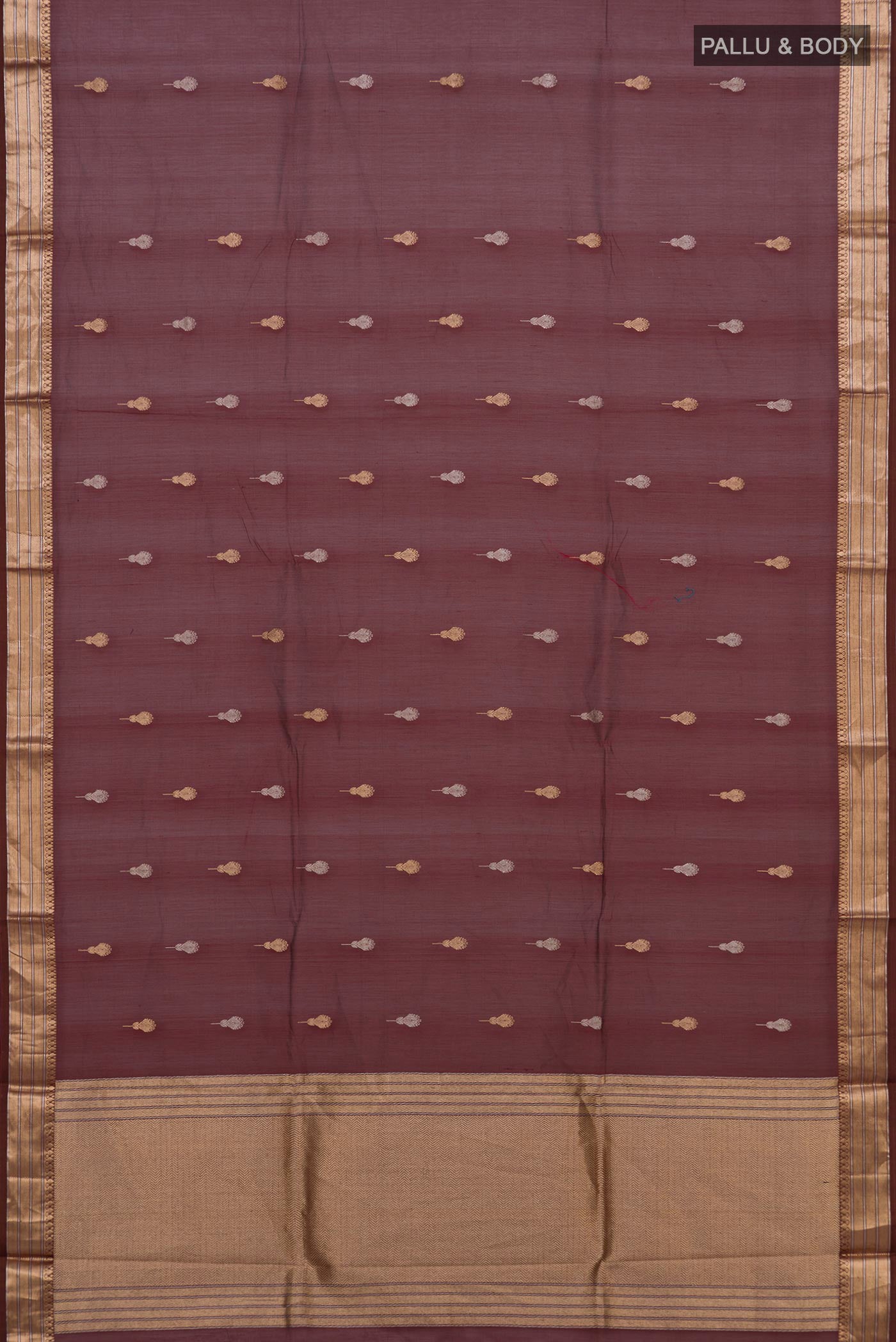 Flat view of Coffee Brown Banarasi Kora Cotton Saree with Zari Butta on the body and Zari Border. 