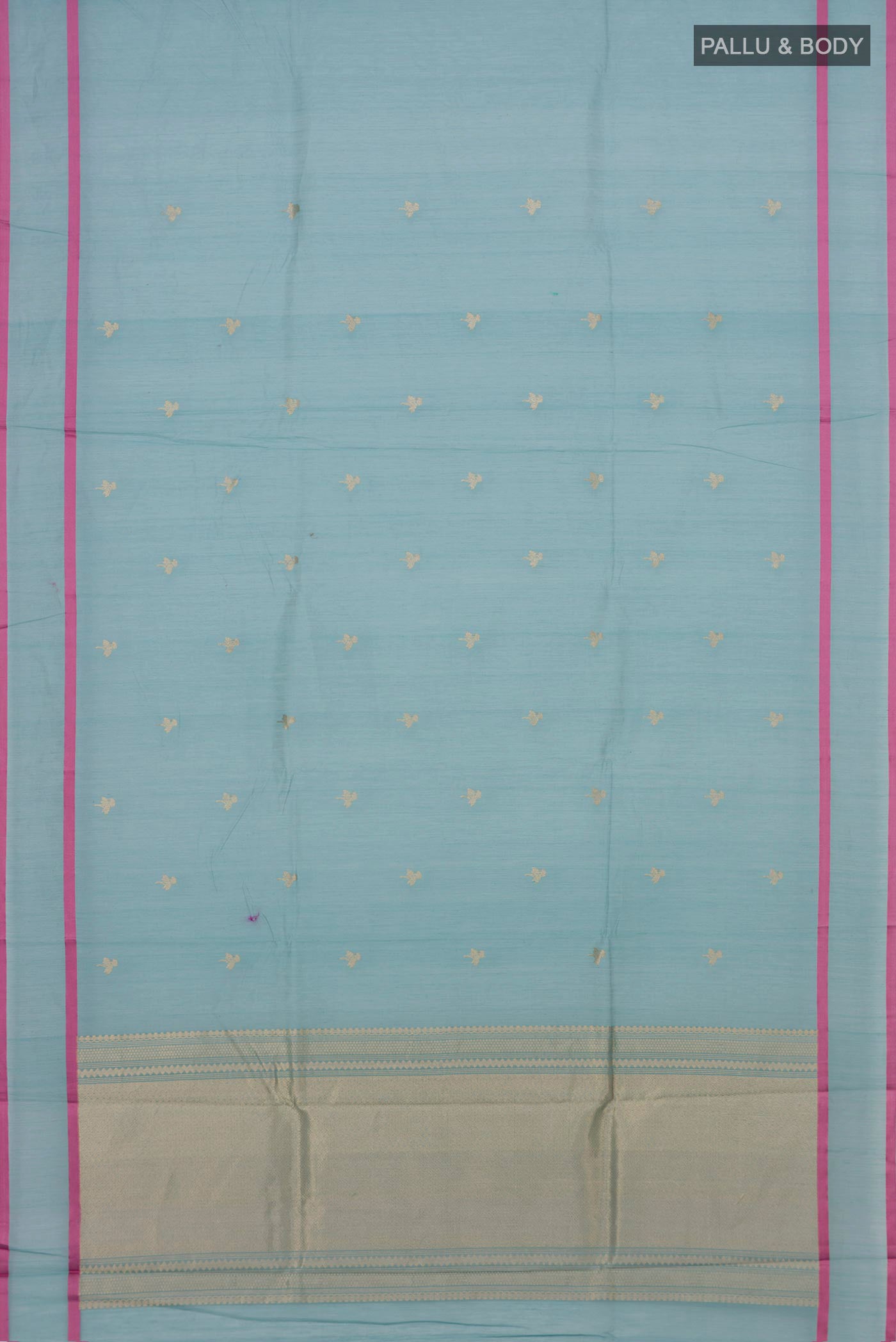 Flat view of Blue Kora Cotton Saree with Zari Butta on the body and Thin Zari Line. 