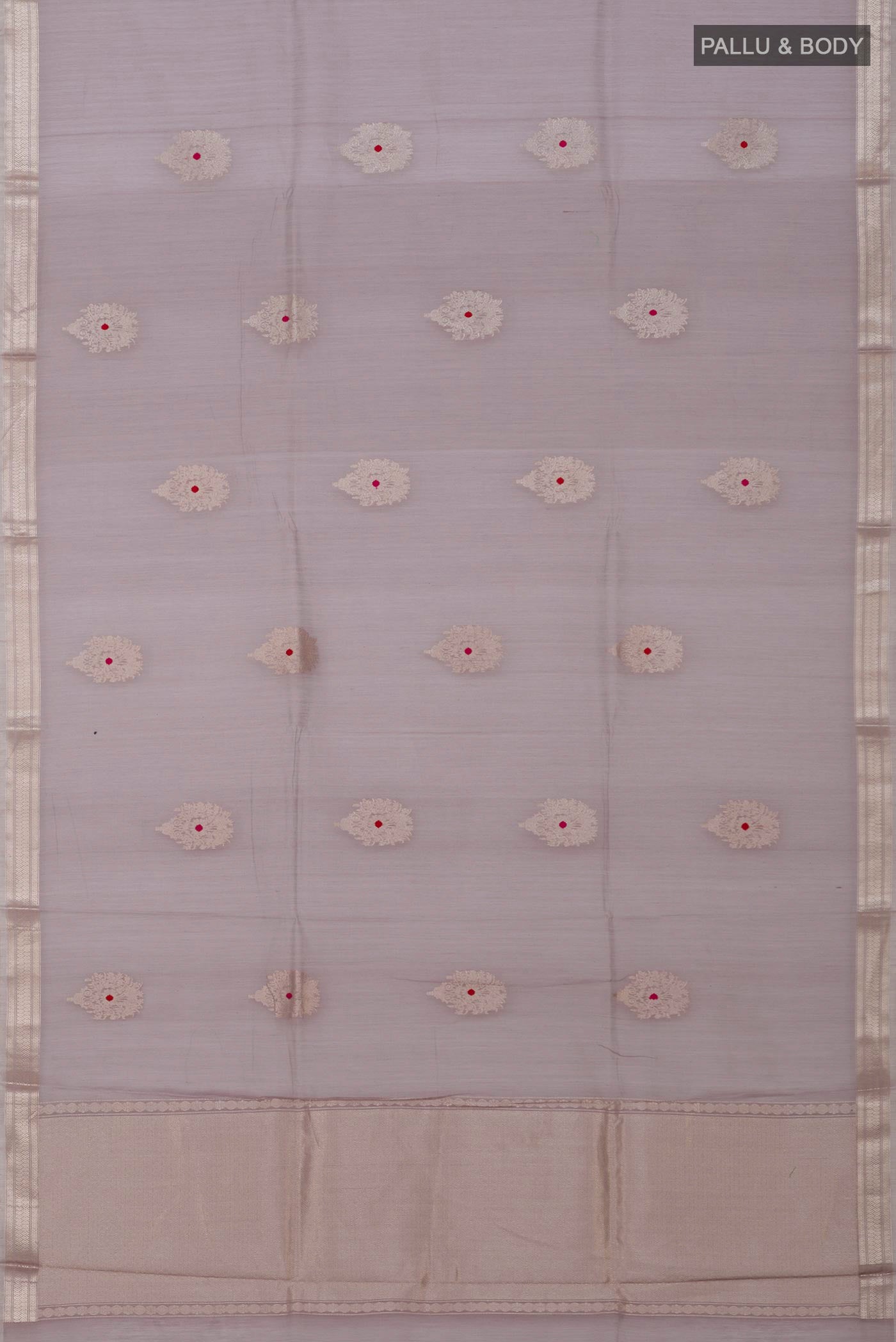 Flat view of Grey Banarasi Kora Cotton Saree with Zari Butta on the body and Zari Border. 
