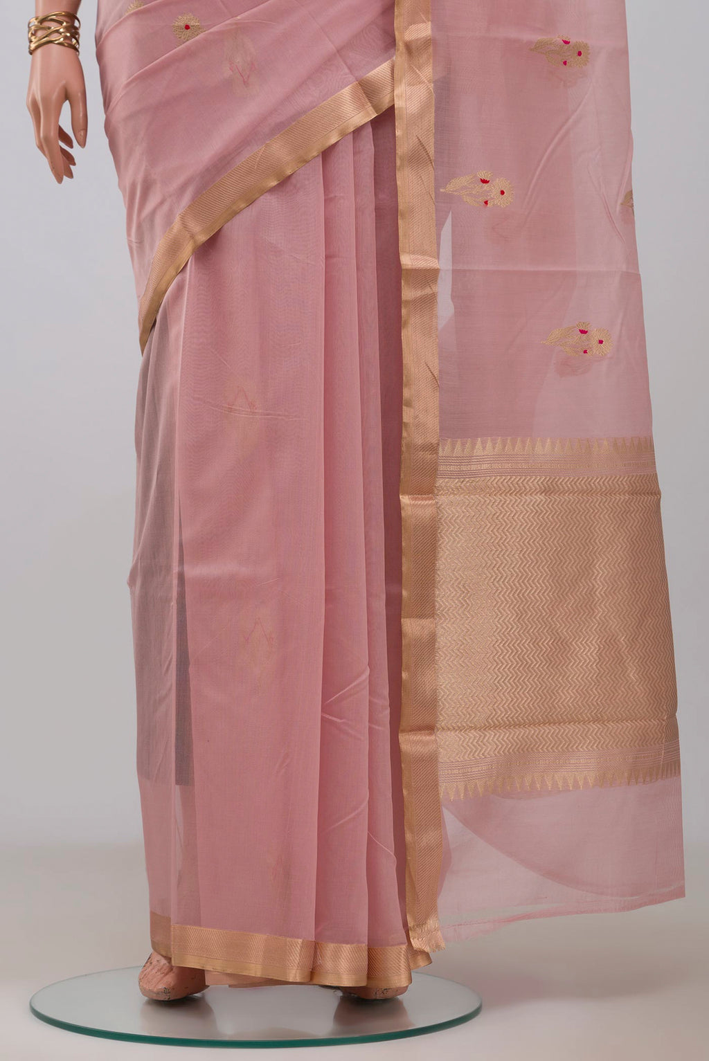 Pleats and pallu of Pink Banarasi Kora Cotton Saree with Zari Butta on the body and Zari Border. 