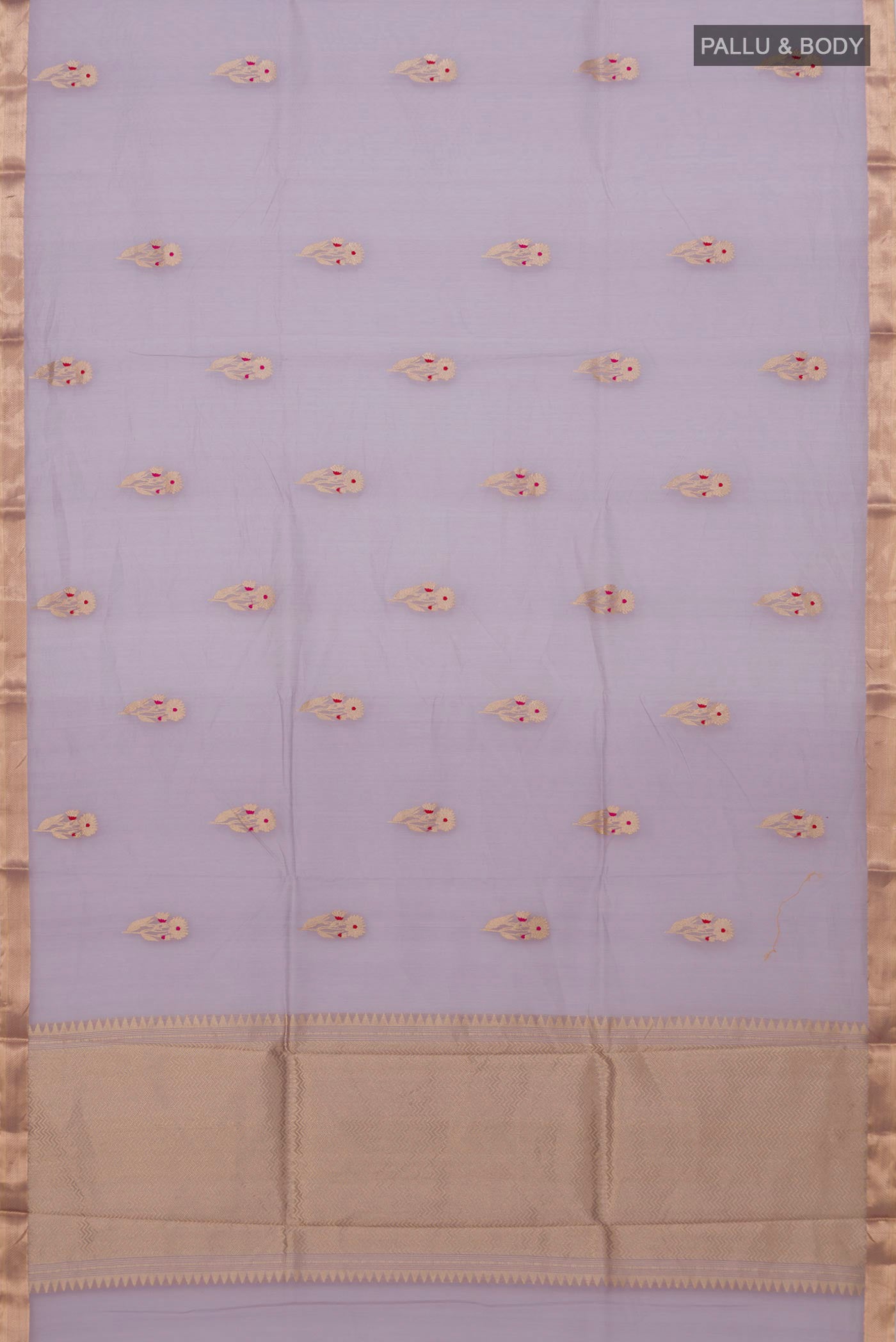Flat view of Lavender Banarasi Kora Cotton Saree with Zari Butta on the body and Zari Border. 