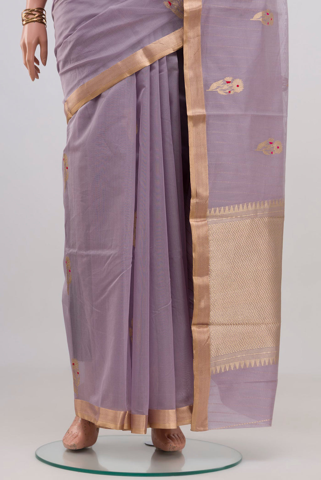 Pleats and pallu of Lavender Banarasi Kora Cotton Saree with Zari Butta on the body and Zari Border. 